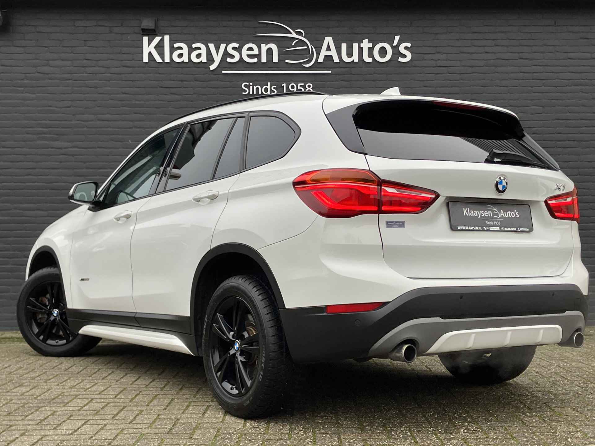 BMW X1 xDrive20i 192 pk High Executive AUT. | dealer onderhouden | cruise control | navigatie | bruin leder interieur | sportstoelen - 8/38