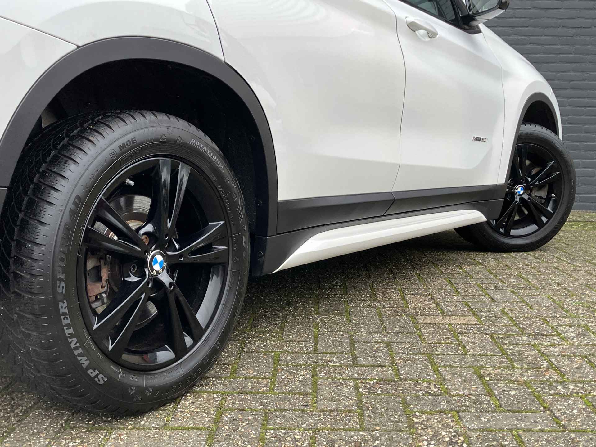 BMW X1 xDrive20i 192 pk High Executive AUT. | dealer onderhouden | cruise control | navigatie | bruin leder interieur | sportstoelen - 11/38