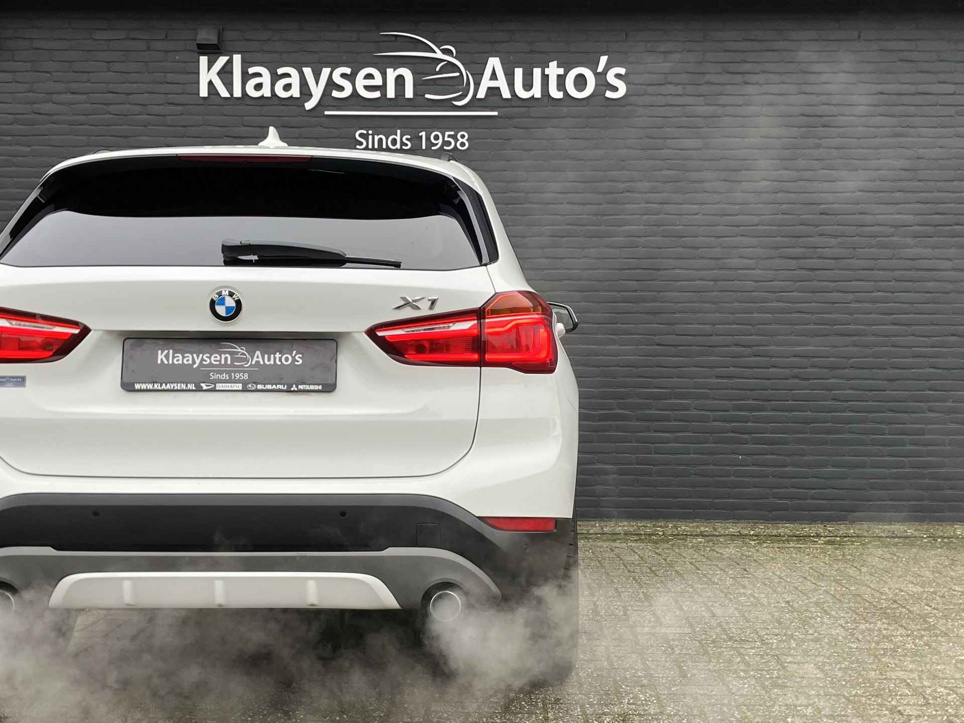 BMW X1 xDrive20i 192 pk High Executive AUT. | dealer onderhouden | cruise control | navigatie | bruin leder interieur | sportstoelen - 13/38