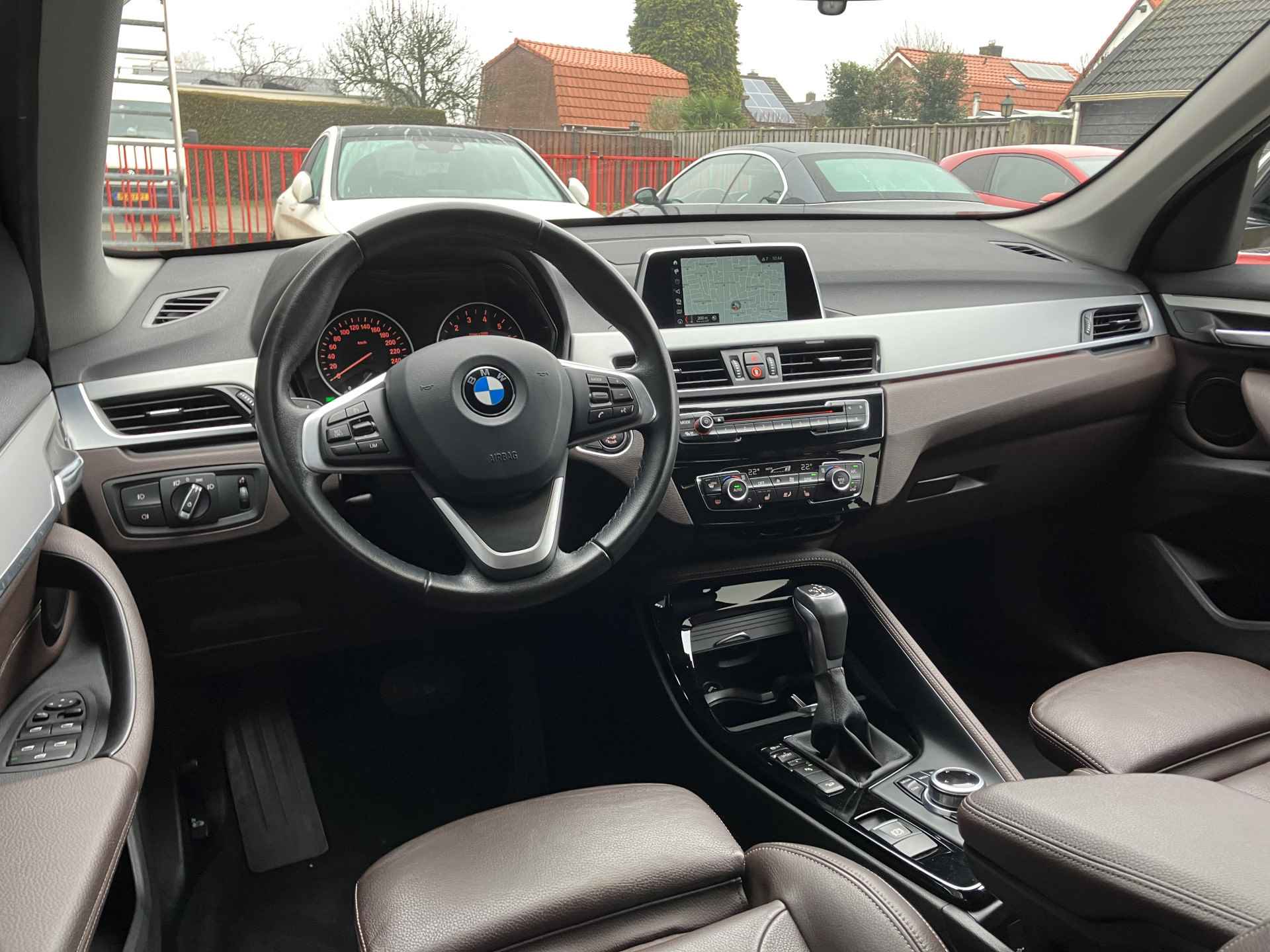 BMW X1 xDrive20i 192 pk High Executive AUT. | dealer onderhouden | cruise control | navigatie | bruin leder interieur | sportstoelen - 14/38