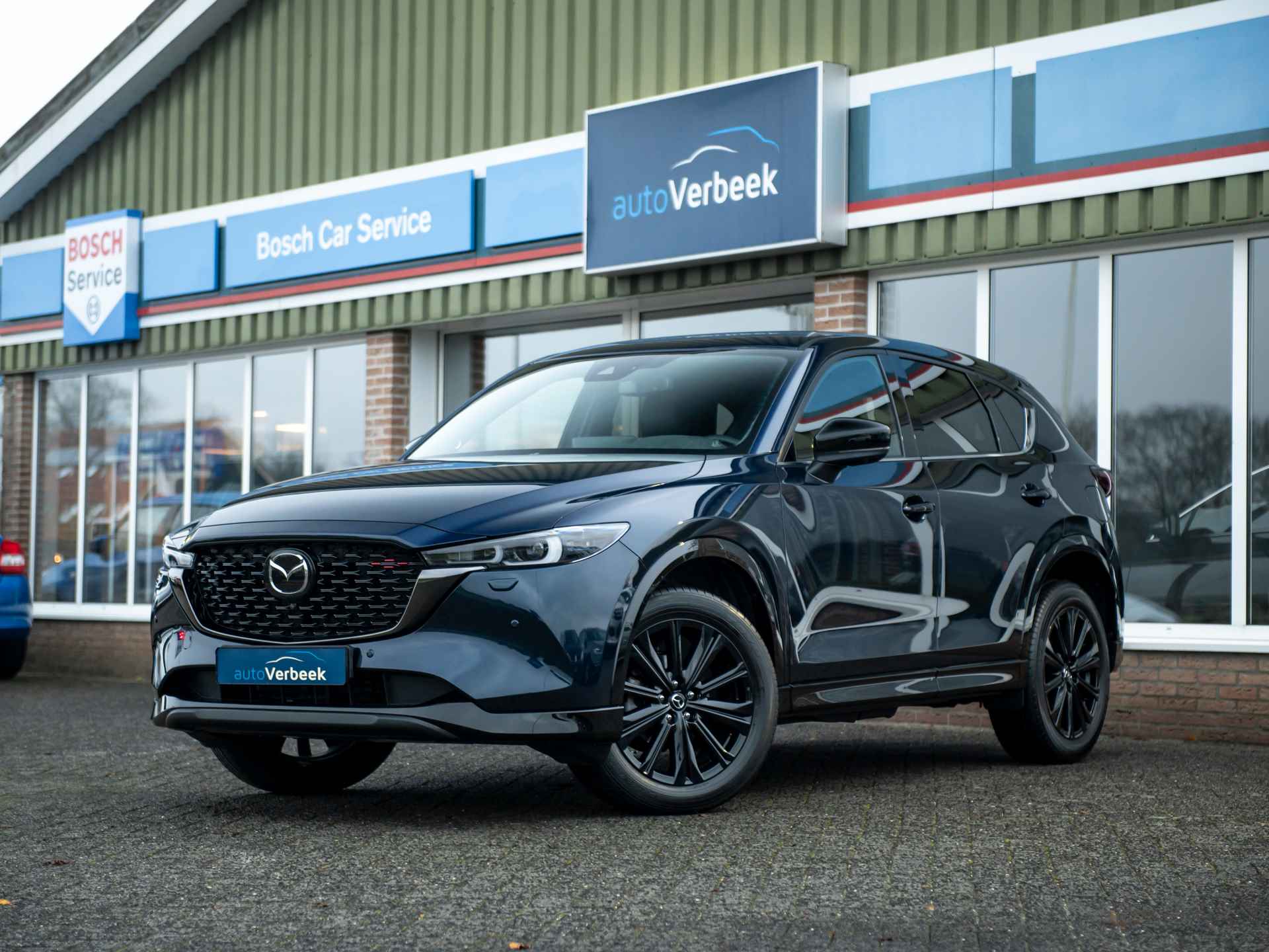 Mazda CX-5 2.0 e-SkyActiv-G M Hybrid 165 Homura | Comfort Pack | Leder | Memory stoel | Stoelventilatie | Stuur- en stoelverwarming | 360gr. camera | Keyless | Adaptive LED | Mazda Radar Cruise Control - 1/54