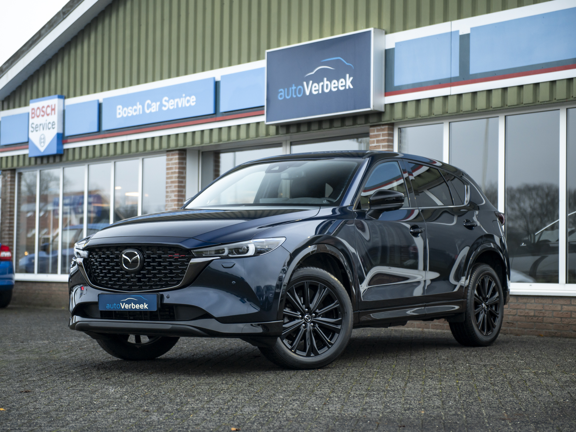 Mazda CX-5 2.0 e-SkyActiv-G M Hybrid 165 Homura | Comfort Pack | Leder | Memory stoel | Stoelventilatie | Stuur- en stoelverwarming | 360gr. camera | Keyless | Adaptive LED | Mazda Radar Cruise Control