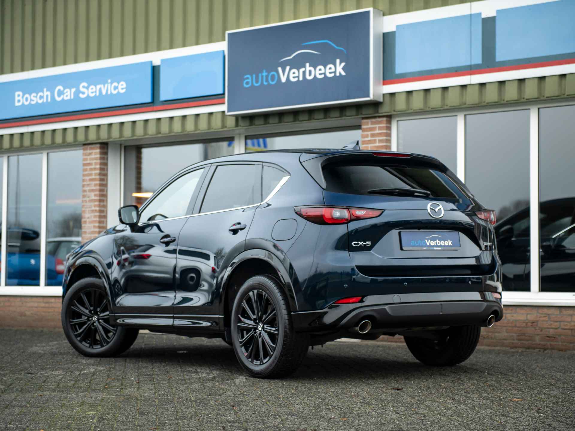 Mazda CX-5 2.0 e-SkyActiv-G M Hybrid 165 Homura | Comfort Pack | Leder | Memory stoel | Stoelventilatie | Stuur- en stoelverwarming | 360gr. camera | Keyless | Adaptive LED | Mazda Radar Cruise Control - 9/54