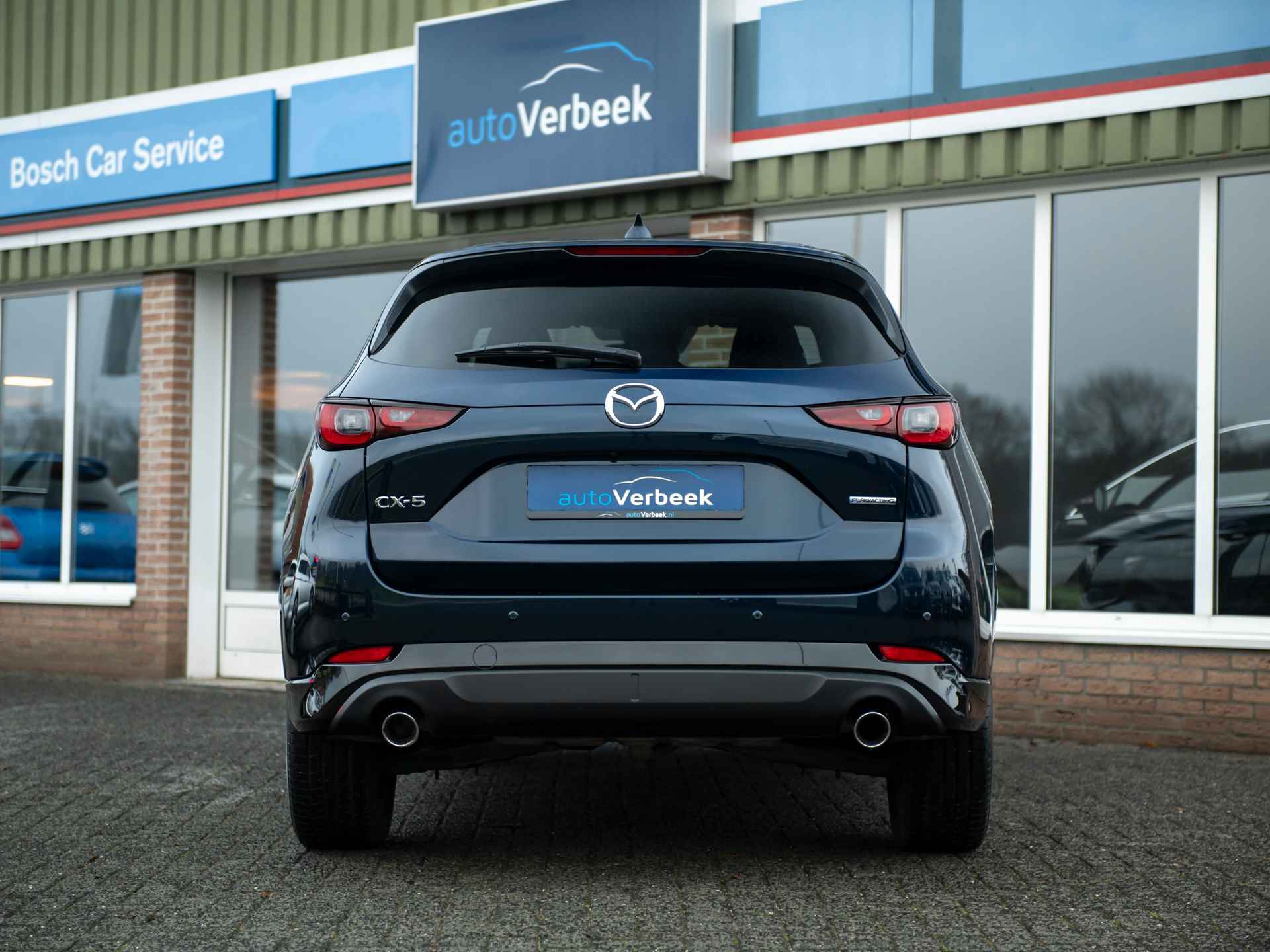 Mazda CX-5 2.0 e-SkyActiv-G M Hybrid 165 Homura | Comfort Pack | Leder | Memory stoel | Stoelventilatie | Stuur- en stoelverwarming | 360gr. camera | Keyless | Adaptive LED | Mazda Radar Cruise Control - 16/54