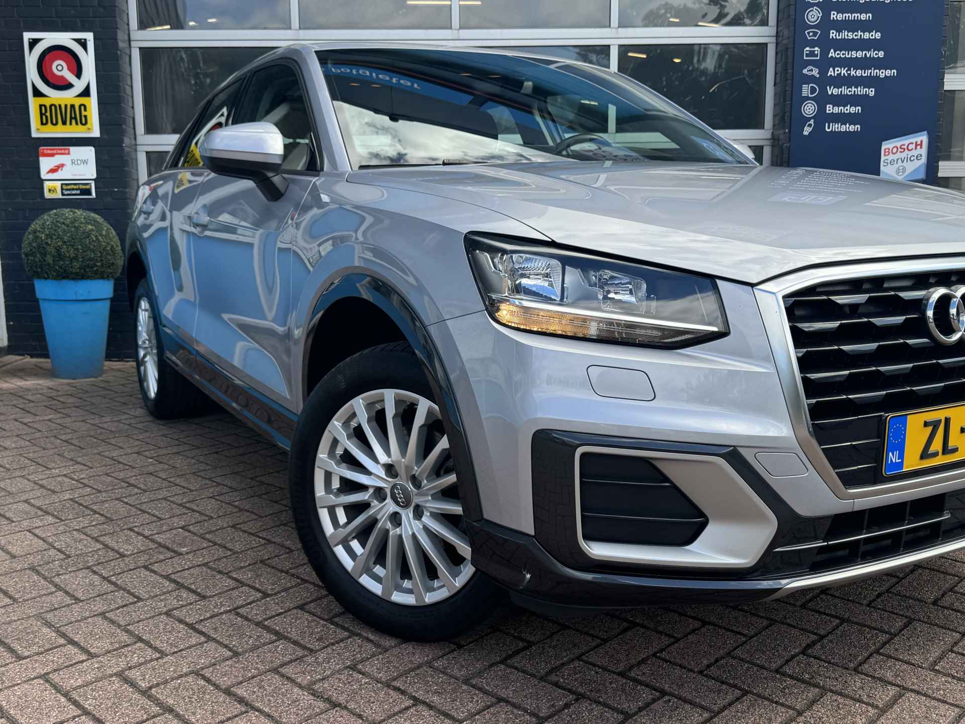 Audi Q2 35 TFSI CoD Design | Airco | Cruise Control | Navigatie | Rijklaar + 12 Maand BOVAG Garantie - 42/47