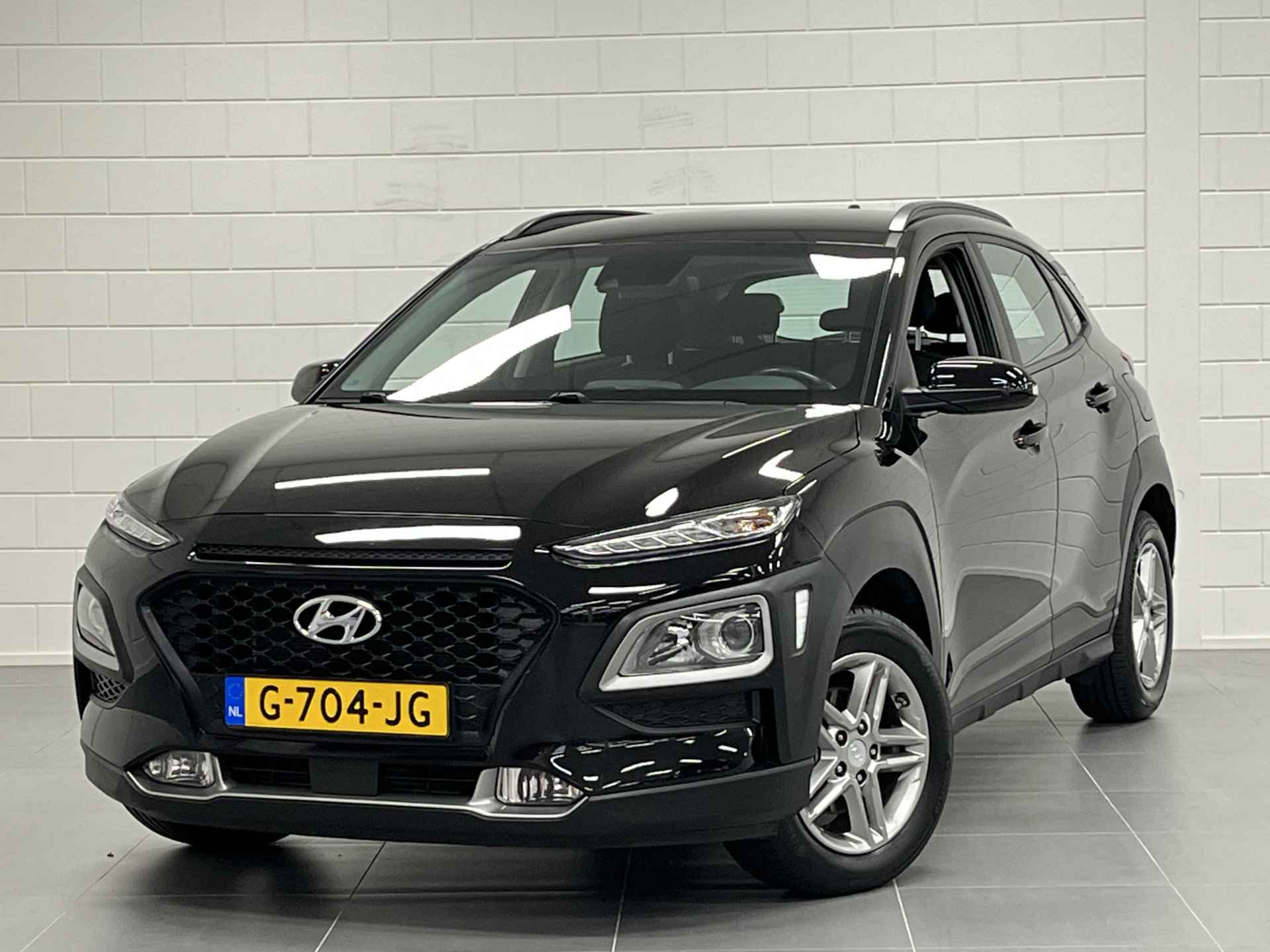 Hyundai KONA 1.0 T-GDI Comfort NAVIGATIE | PARKEERCAMERA | CRUISE CONTROL | NETTE AUTO MET HOGE INSTAP! - 39/43