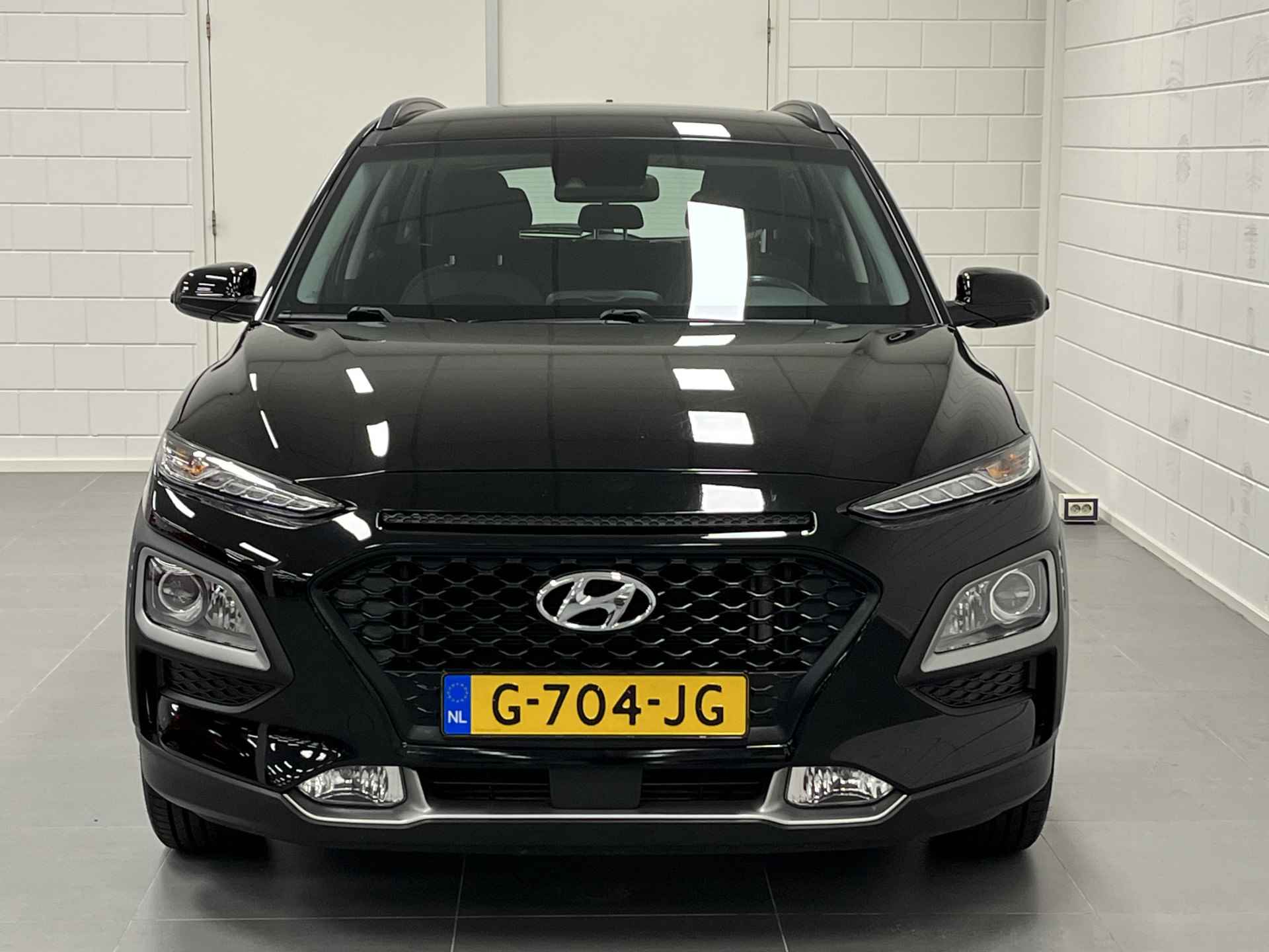 Hyundai KONA 1.0 T-GDI Comfort NAVIGATIE | PARKEERCAMERA | CRUISE CONTROL | NETTE AUTO MET HOGE INSTAP! - 40/43