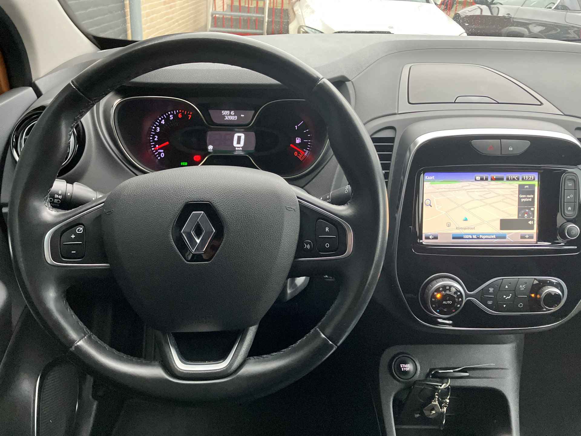 Renault Captur 1.3 TCe Intens | 1e eigenaar | dealer onderhouden | bi-tone | navigatie | cruise control | camera | trekhaak - 23/35