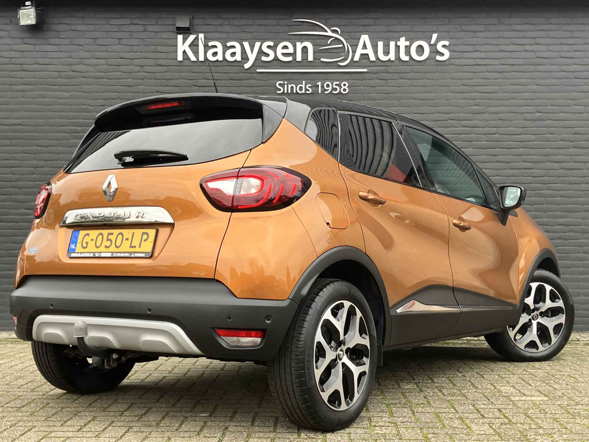 Renault Captur 1.3 TCe Intens | 1e eigenaar | dealer onderhouden | bi-tone | navigatie | cruise control | camera | trekhaak - 6/35