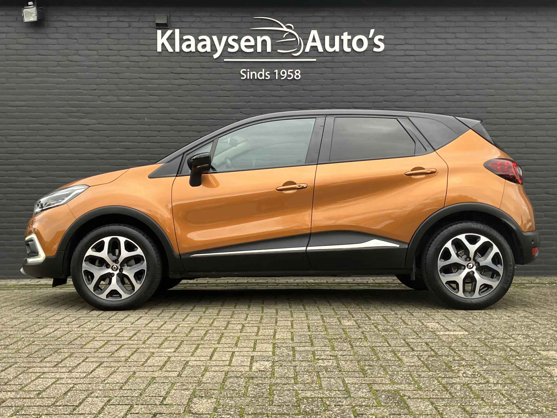 Renault Captur 1.3 TCe Intens | 1e eigenaar | dealer onderhouden | bi-tone | navigatie | cruise control | camera | trekhaak - 9/35