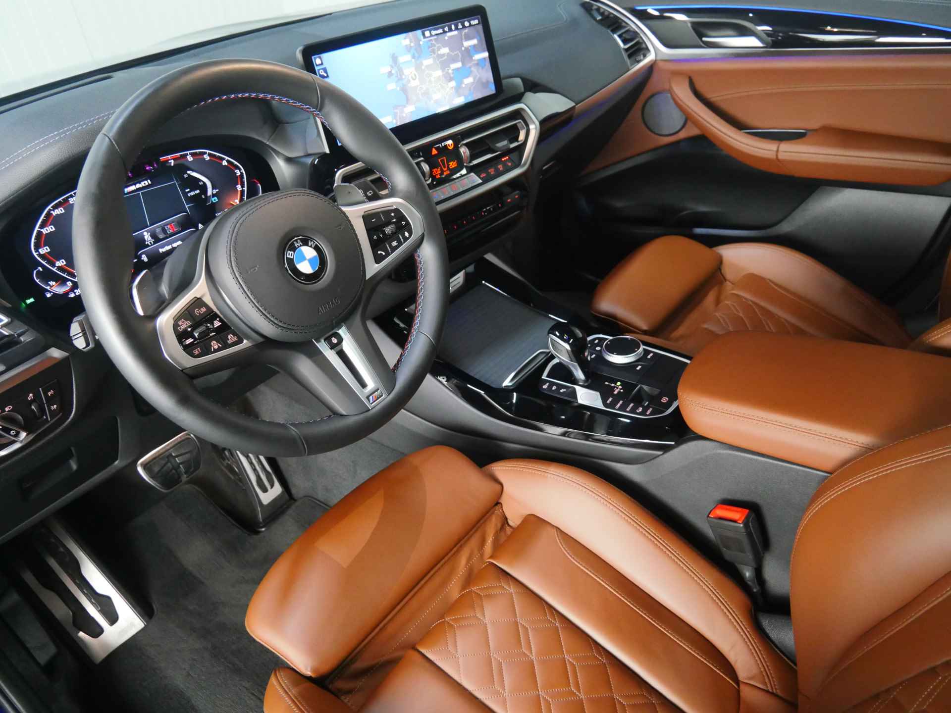 BMW X3 M40i xDrive High Executive Automaat / Panoramadak / Trekhaak / Laserlight / Sportstoelen / Adaptief M Onderstel / Parking Assistant Plus / Comfort Access - 10/39