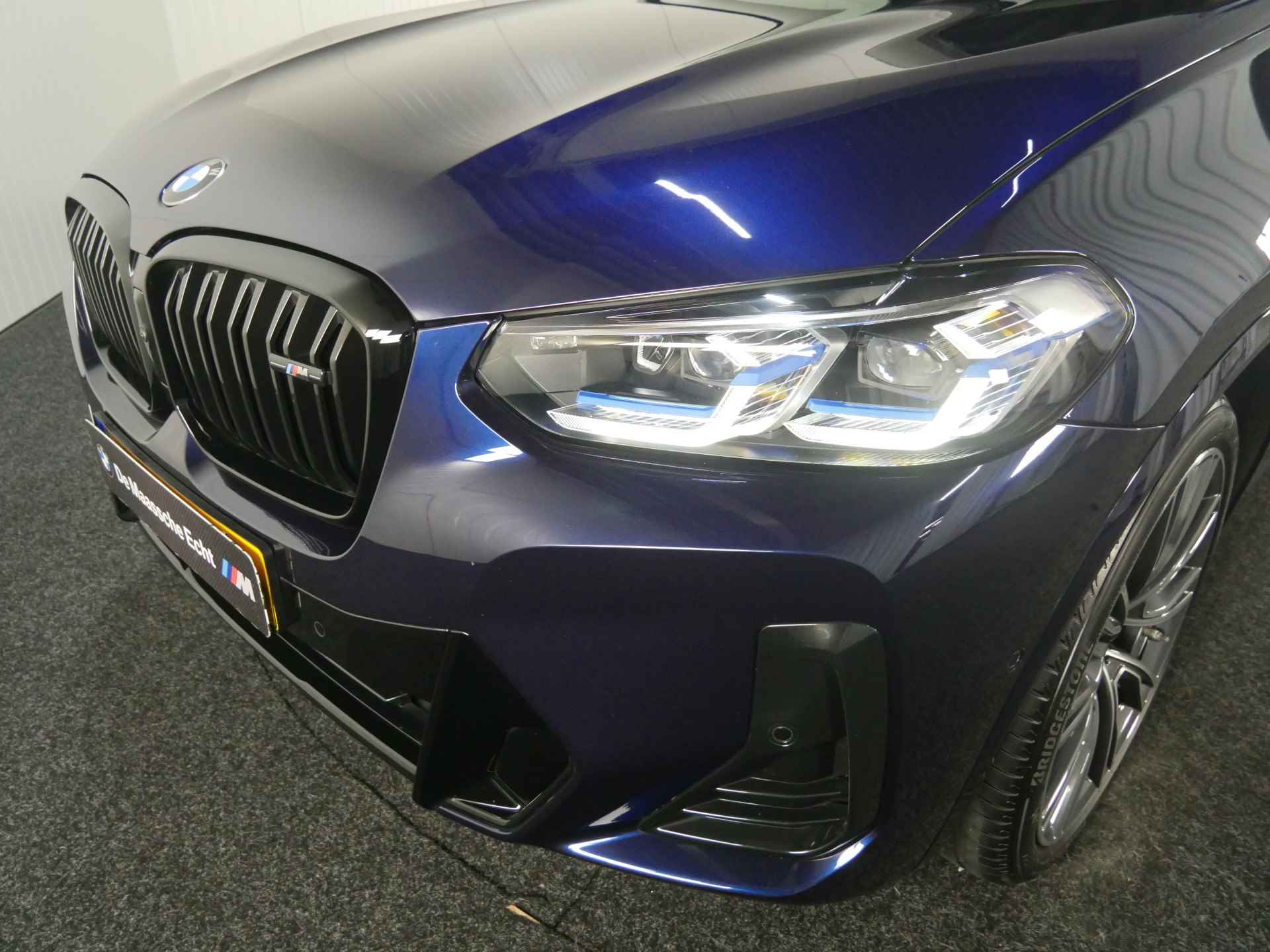 BMW X3 M40i xDrive High Executive Automaat / Panoramadak / Trekhaak / Laserlight / Sportstoelen / Adaptief M Onderstel / Parking Assistant Plus / Comfort Access - 26/39