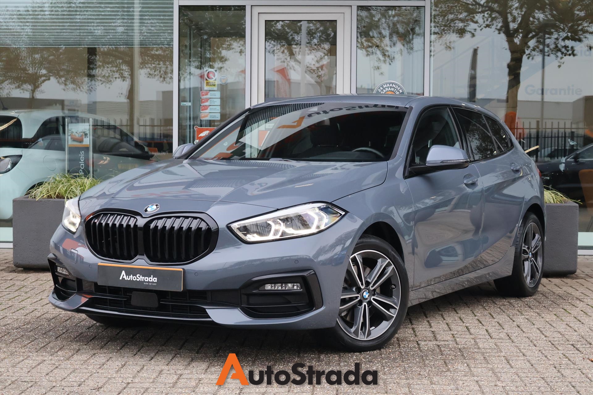 BMW 1-Serie (f40) 118i Sportline 136pk Aut | Storm Bay | Carplay | Cruise | DAB | 1e Eigenaar