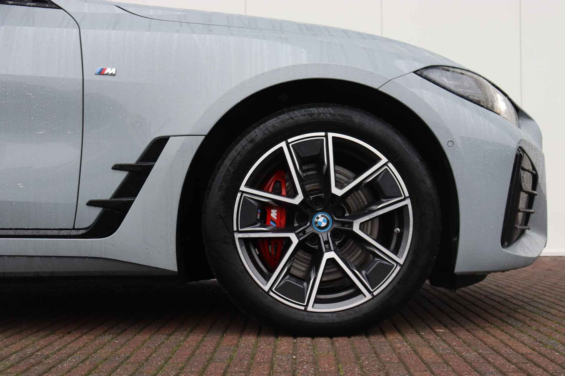 BMW i4 eDrive35 High Executive 70 kWh M-Sportpakket / Schuif - Kanteldak / Comfor Access / Extra Getint Glas / HIFI / - 5/34