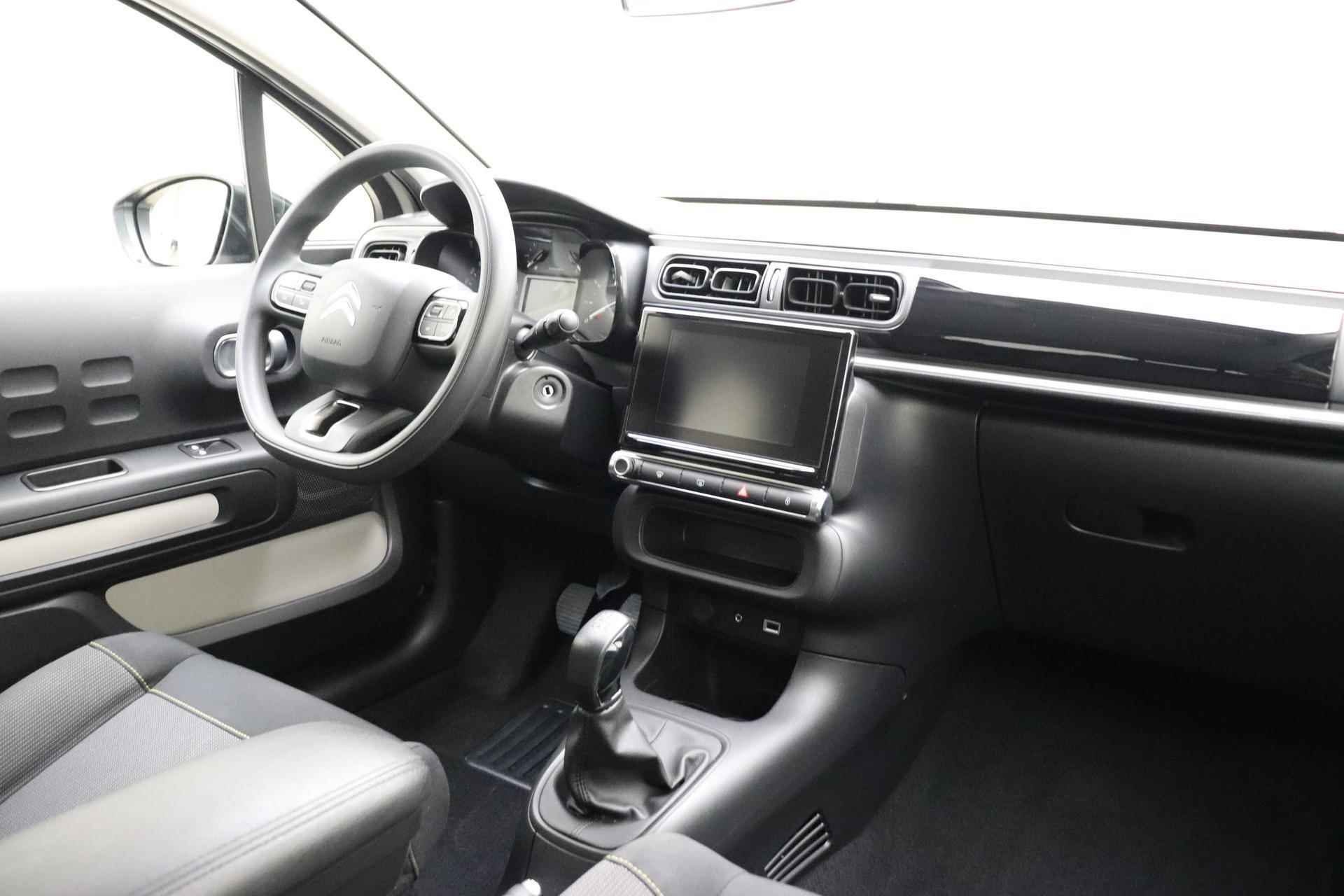 Citroen C3 1.2 PureTech Feel Edition 82 PK | Handgeschakeld | Trekhaak | Cruise Control | Airco | Parkeersensor | Navigatie | 1e eigenaar - 4/30