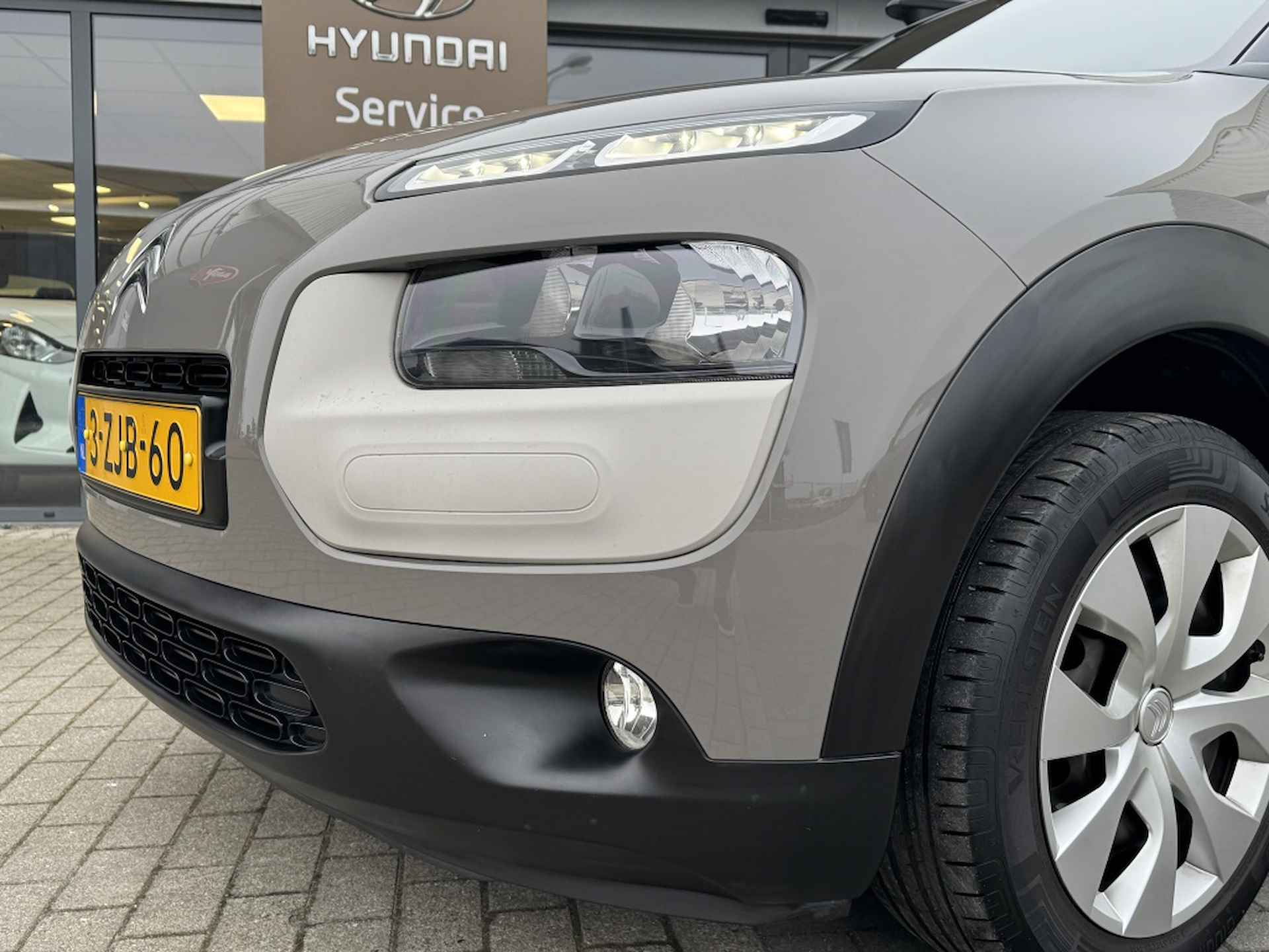 Citroen C4 Cactus 1.2 e-VTi Feel | Automaat | Dealer onderhouden | Trekhaak! | Air - 7/28