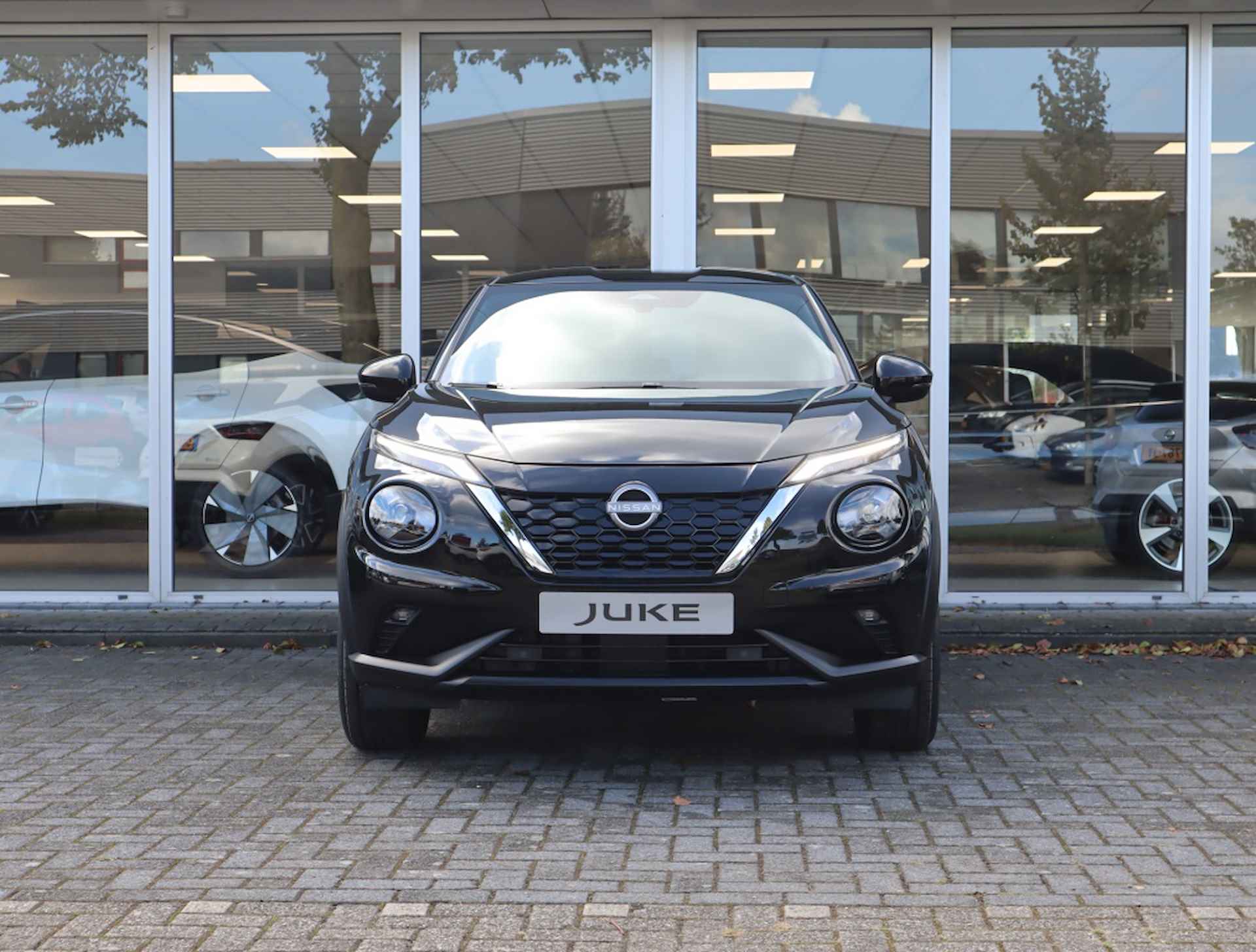 Nissan Juke 1.0 DIG-T N-Connecta / Cruise control / Achteruitrij camera - 11/28