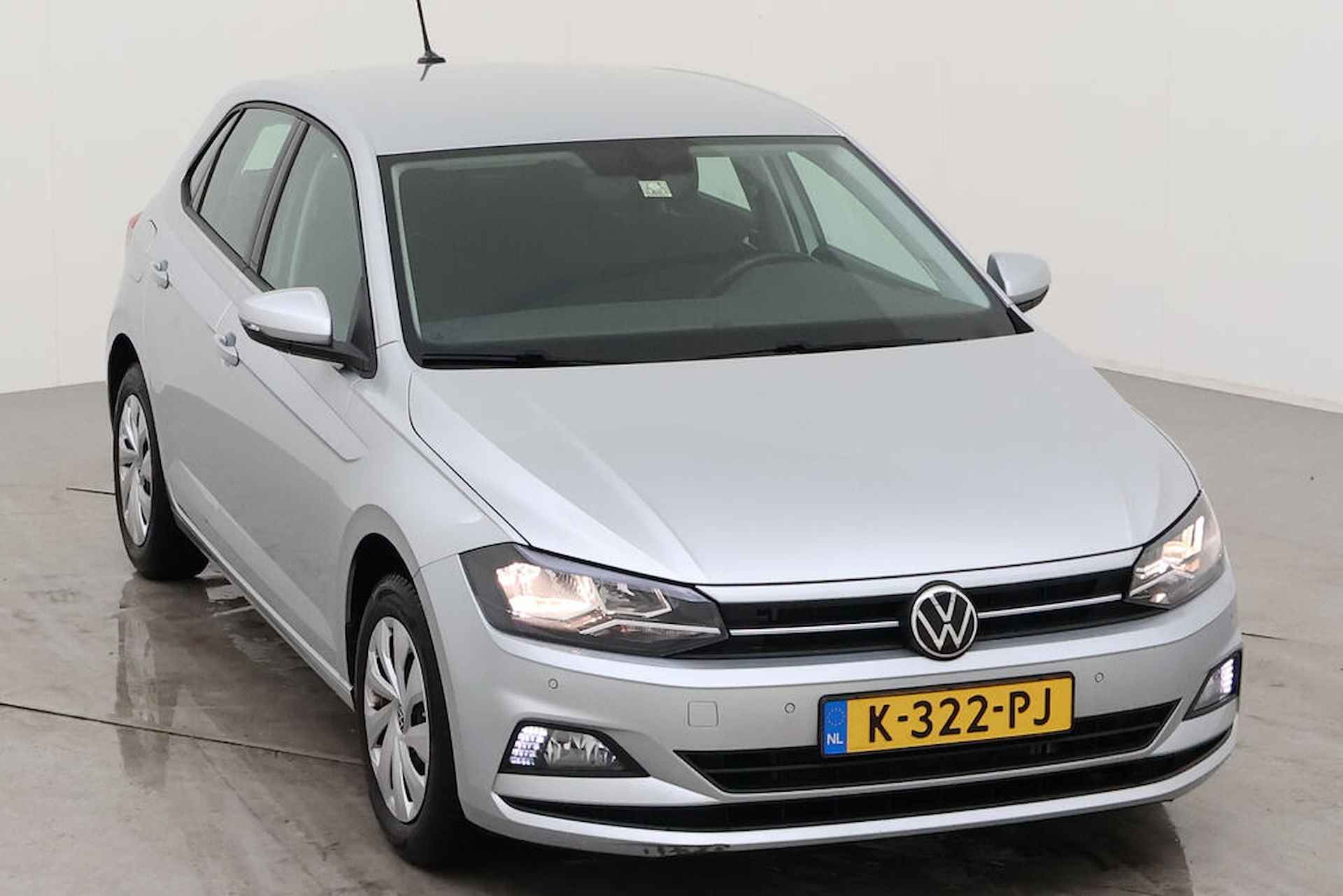 Volkswagen Polo 1.0 TSI Comfortline DSG/ Metallic/ Clima/ Navi/ Parkeersensor V. + A. - 5/13