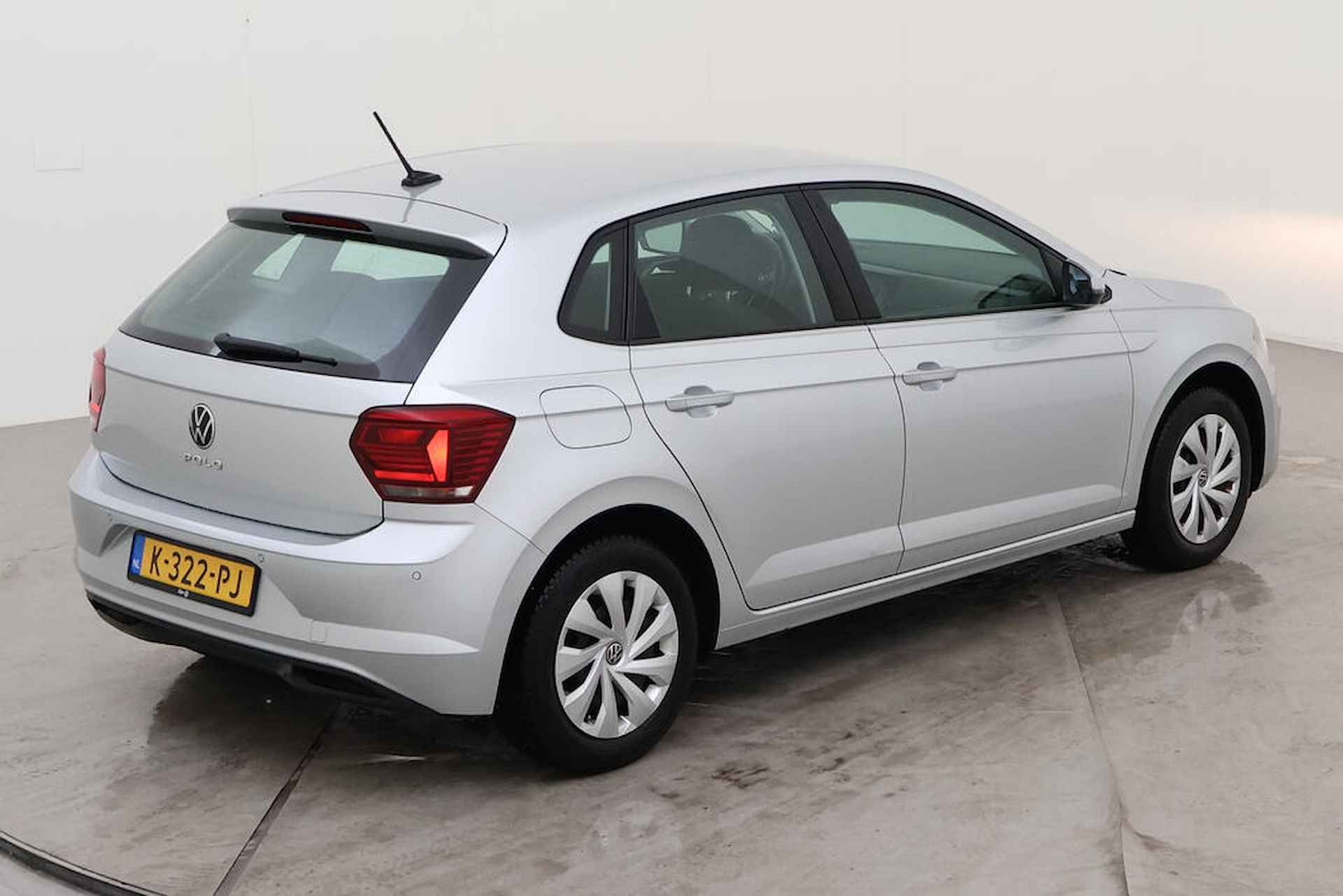 Volkswagen Polo 1.0 TSI Comfortline DSG/ Metallic/ Clima/ Navi/ Parkeersensor V. + A. - 7/13