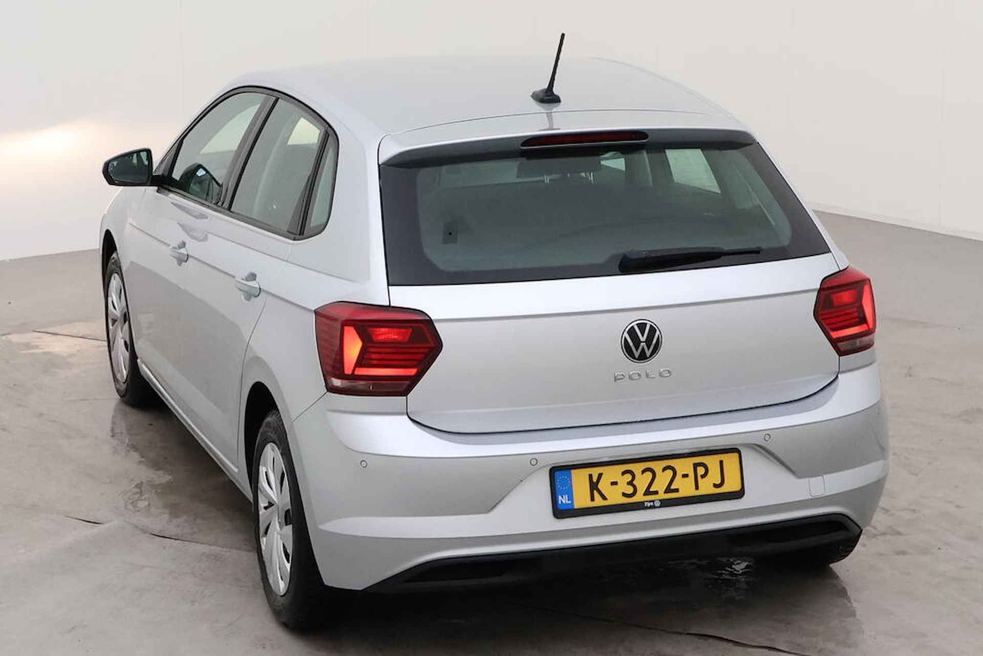 Volkswagen Polo 1.0 TSI Comfortline DSG/ Metallic/ Clima/ Navi/ Parkeersensor V. + A. - 9/13