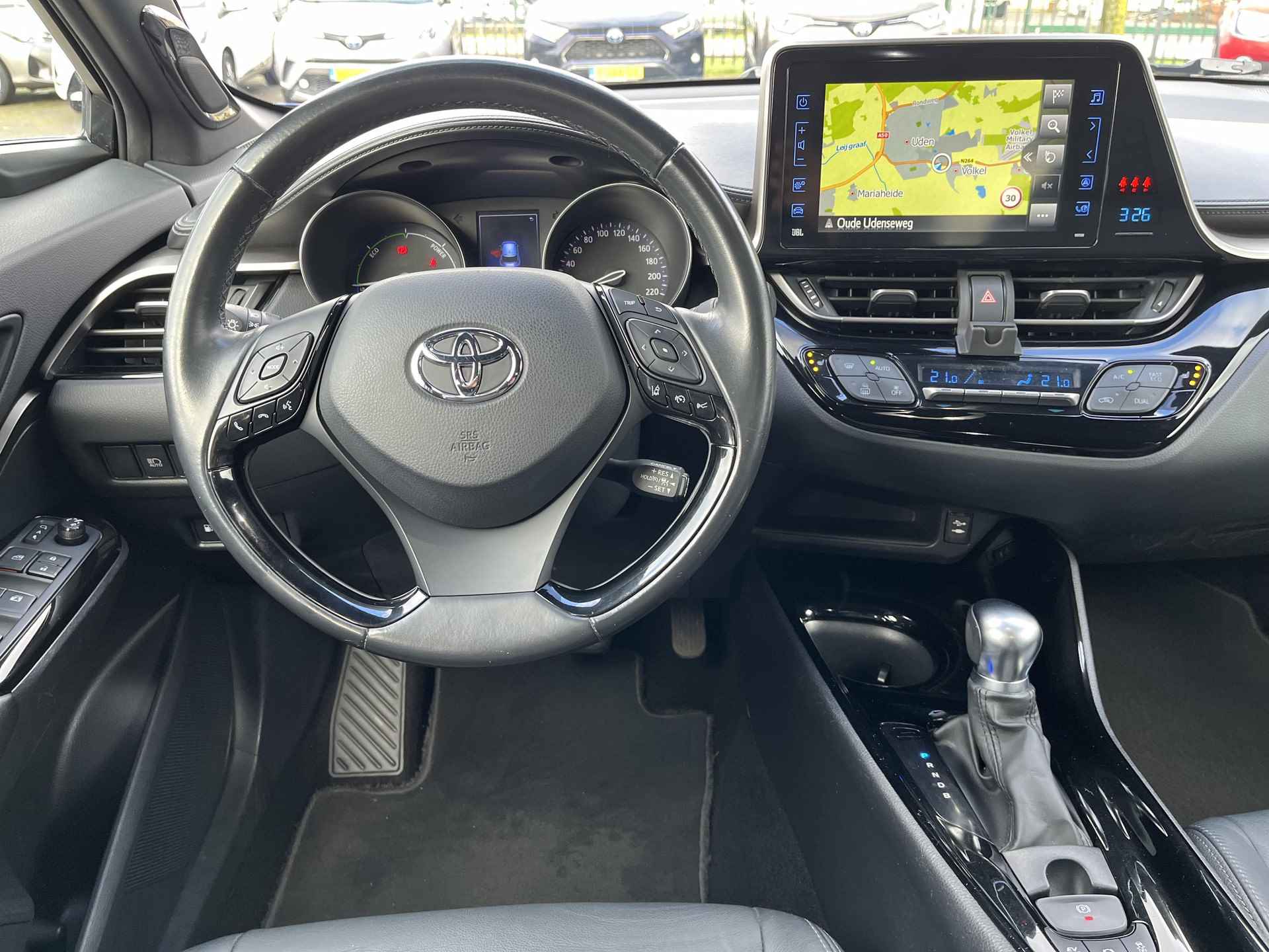 Toyota C-HR 1.8 Hybride Bi-Tone | Navigatie | Achteruitrijcamera - 16/32