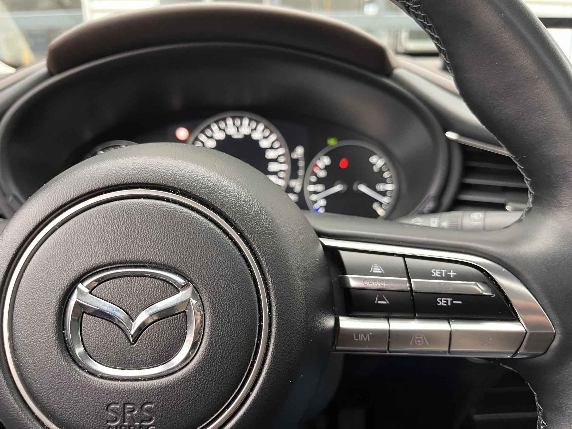 Mazda CX-30 2.0 186PK e-SkyActiv-X M Hybrid Luxury | Schuif/kanteldak | Leder+memory | Ad. Cruise | Stoel/stuurverw. | Bose | El. Klep | LMV 18 inch - 13/28