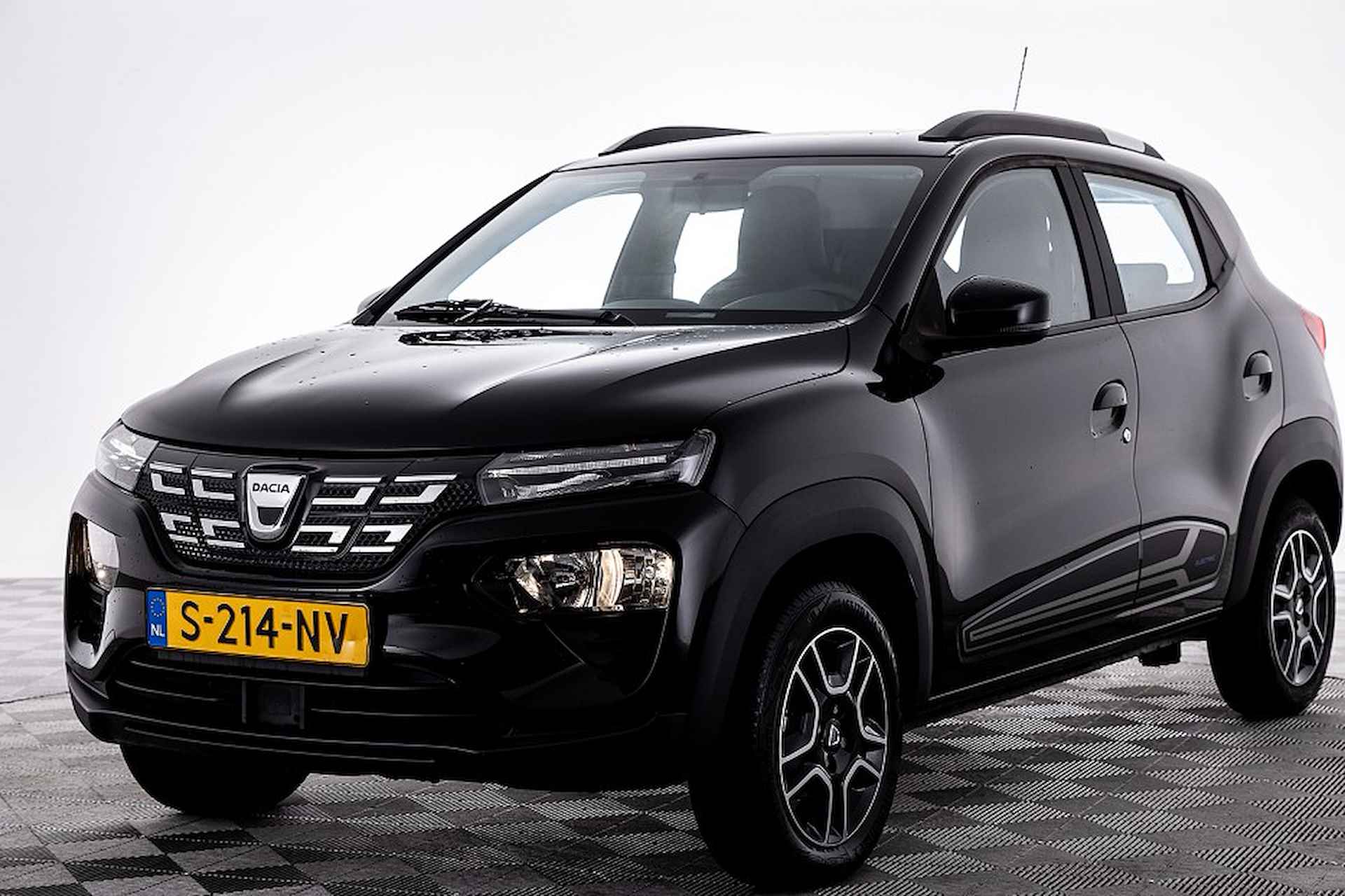 Dacia Spring Comfort Plus 27 kWh | NAVI | LED | Half LEDER ✅ 1e Eigenaar . - 22/27