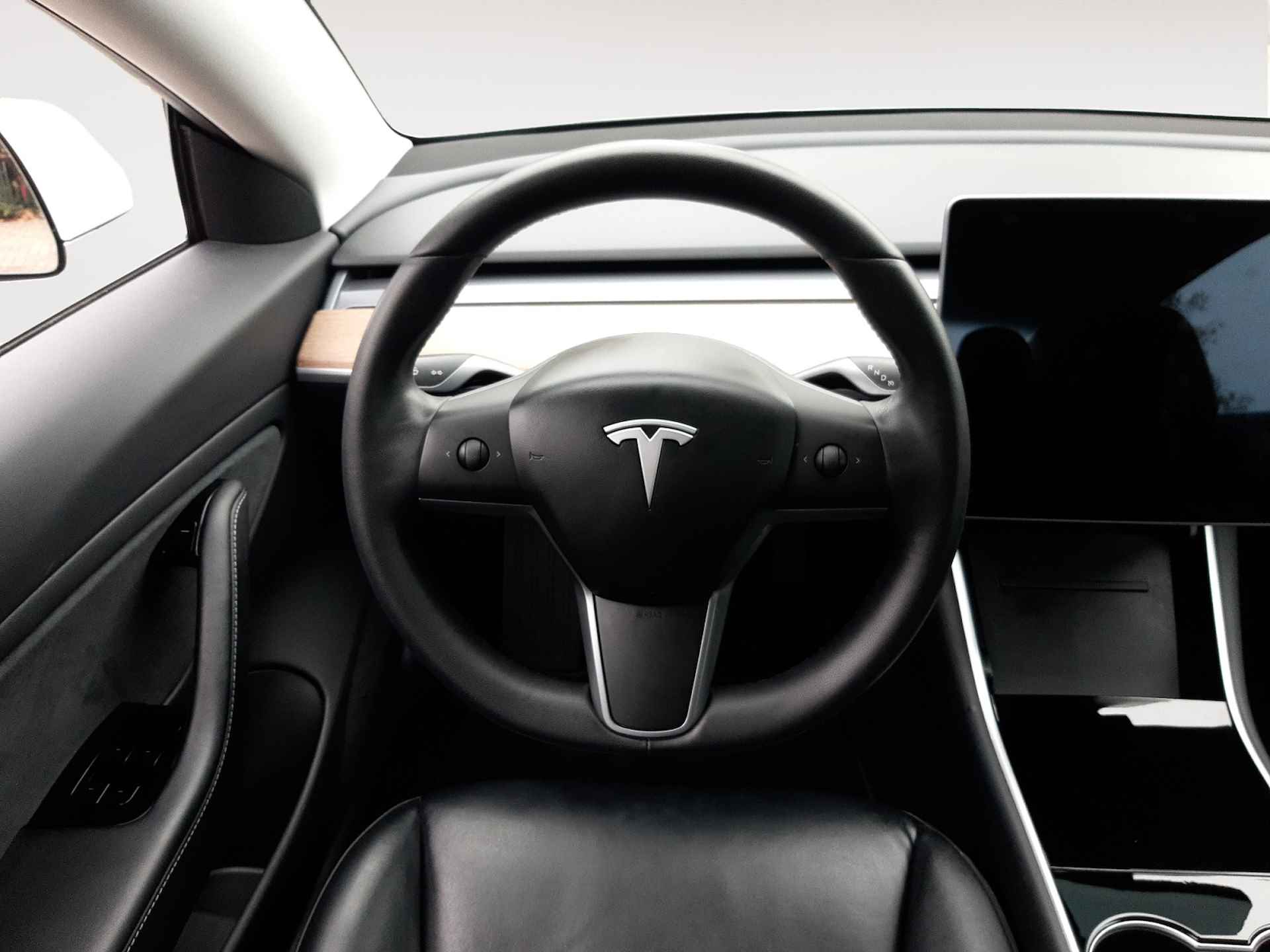 Tesla Model 3 Long Range AWD 75 kWh (461 PK) 1e-Eig, Keurig-Onderh, 12-Mnd-BOVAG, NL-Auto, Trekhaak, Leer, Autopilot, Keyless-Entry/Start, Achteruitrijcamera, Parkeersensoren-V+A, Stoelverwarming-V+A, Bluetooth, Licht-Zicht-Pakket, Lm-Velgen-18Inch, Privacy-Glas - 21/31