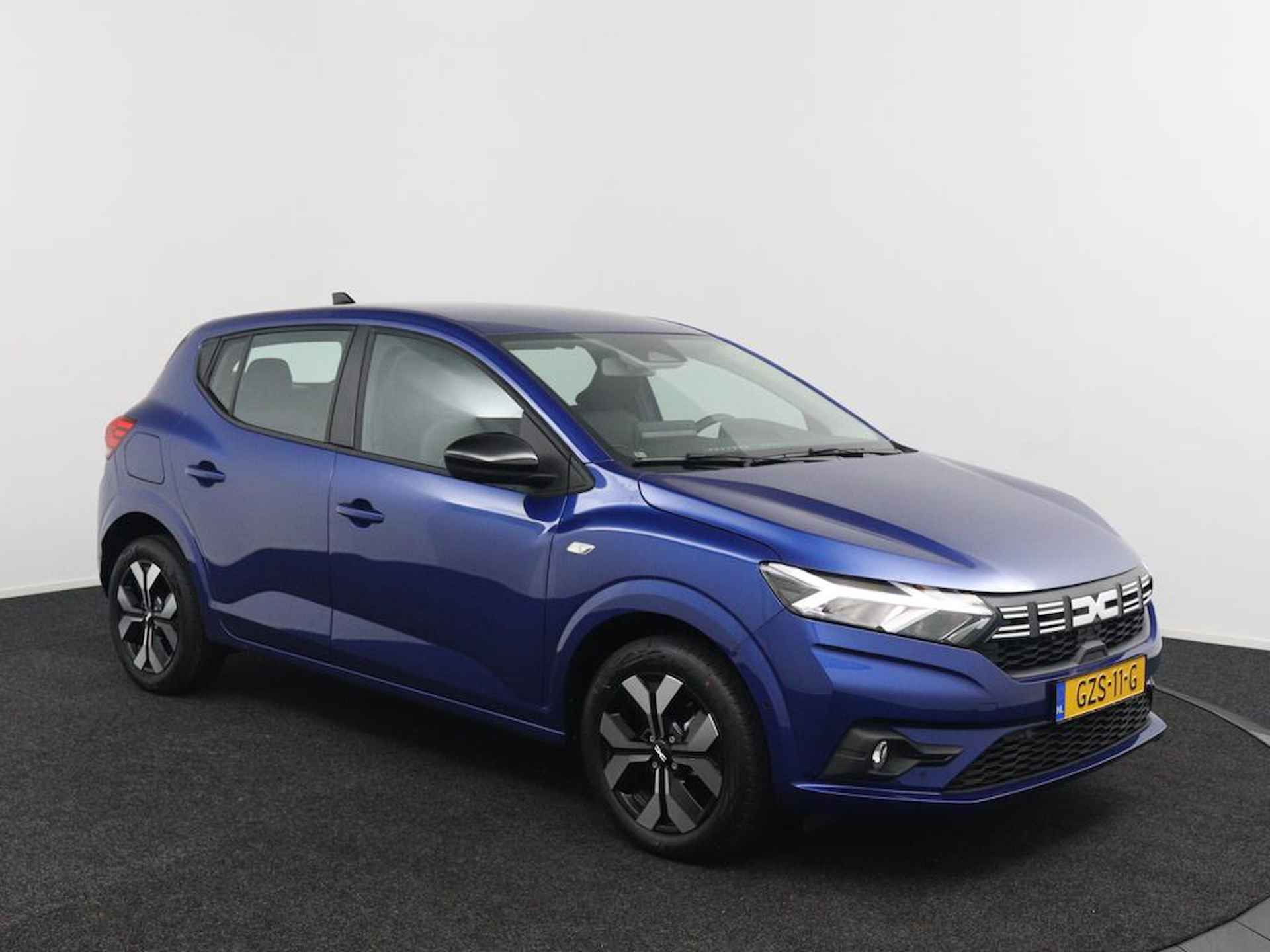 Dacia Sandero 1.0 TCe 100 ECO-G Journey | Demo | Navigatie | Camera | Stoelverwarming | Climate Control | LED Koplampen | Parkeersensoren | Metallic Lak | Lichtmetalen Velgen | Cruise Control | Lichtsensor | - 7/41