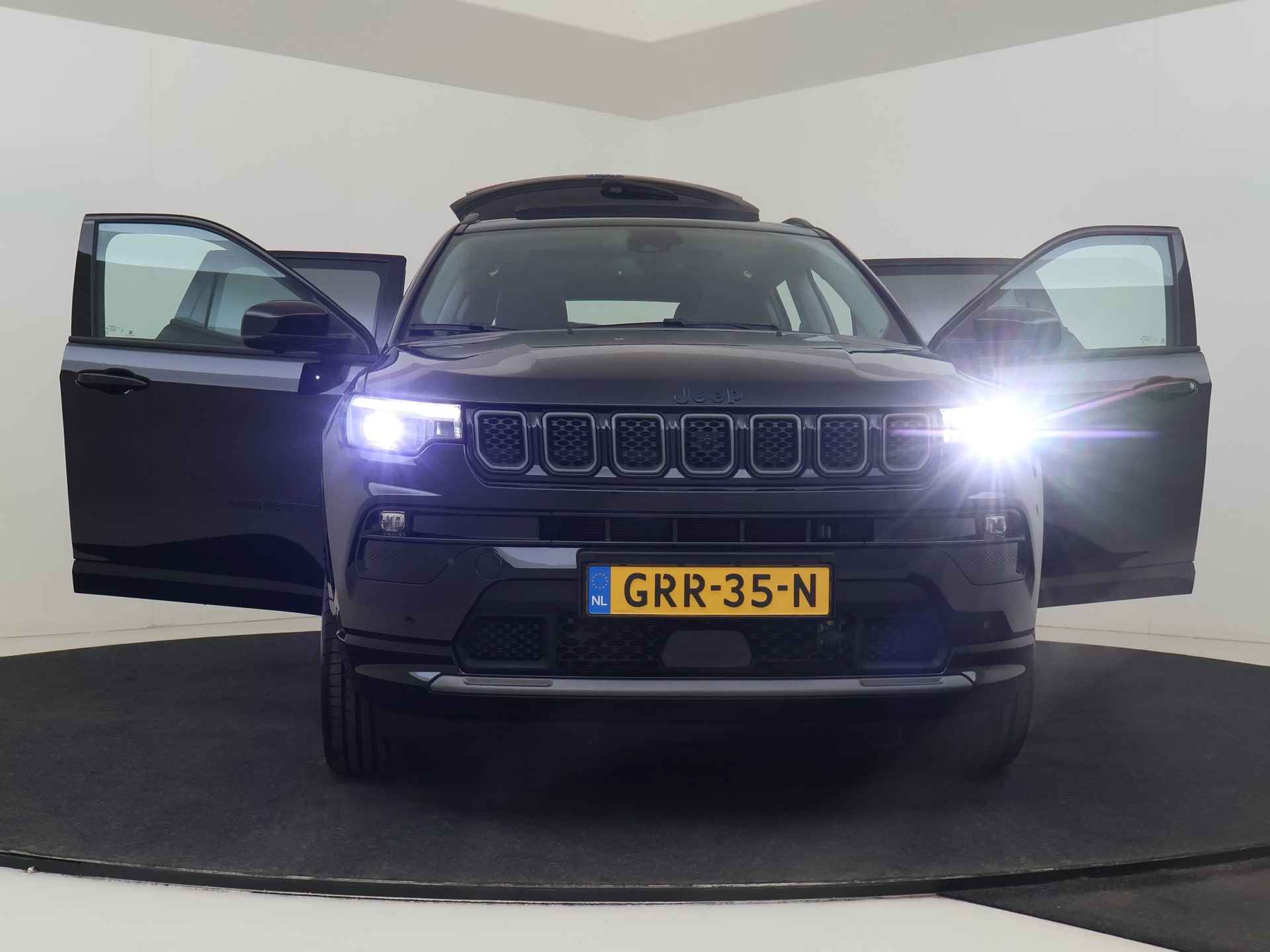 Jeep Compass 4xe 240 Plug-in Hybrid Electric S | Schuif kanteldak | Leder interieur | Navigatie | Camera - 23/57