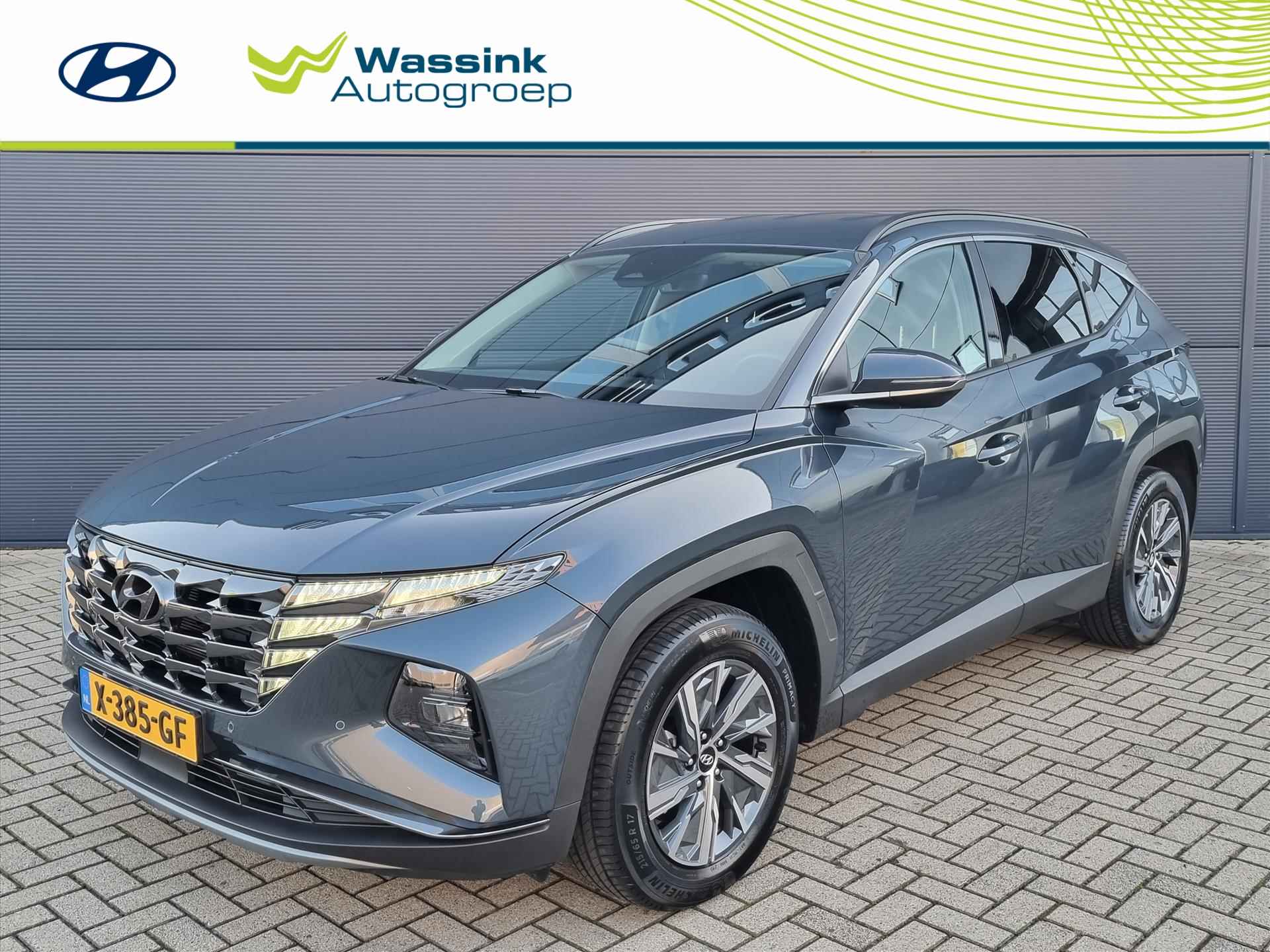 Hyundai Tucson 1.6 T-GDi HEV 230pk Comfort Smart | Navigatie | Camera | Stoel-/Stuurverwarming | Climate Control | Apple Carplay | Krell Sound Systeem | - 1/47