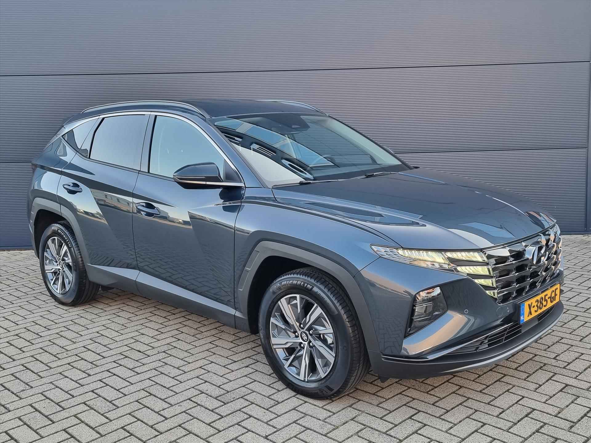 Hyundai Tucson 1.6 T-GDi HEV 230pk Comfort Smart | Navigatie | Camera | Stoel-/Stuurverwarming | Climate Control | Apple Carplay | Krell Sound Systeem | - 7/47