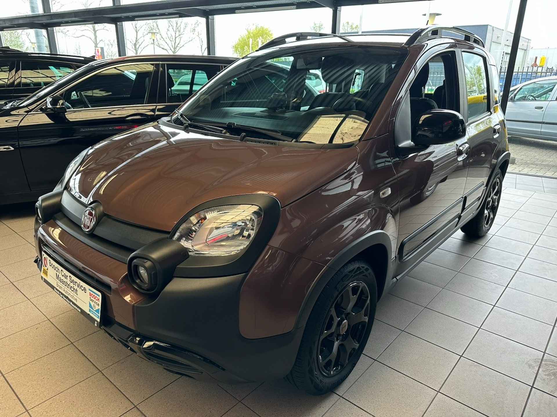 Fiat Panda 1.2 City Cross Trussardi | Italian Brown | Leer | Unieke verschijning Interesse, Proefrit? Bel of app met: 06-24 28 28 42 - 18/23