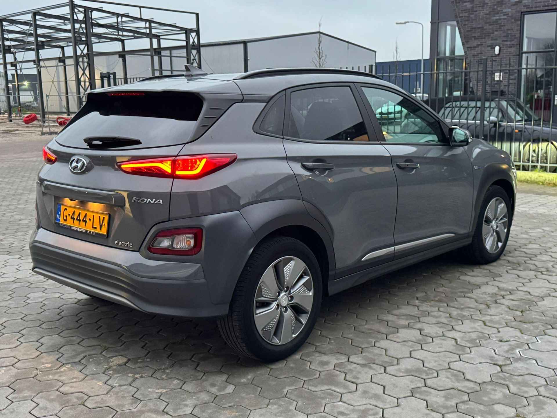 Hyundai Kona EV Premium 64 kWh ✅ Camera ✅ Leder ✅ Vol opties - 4/13