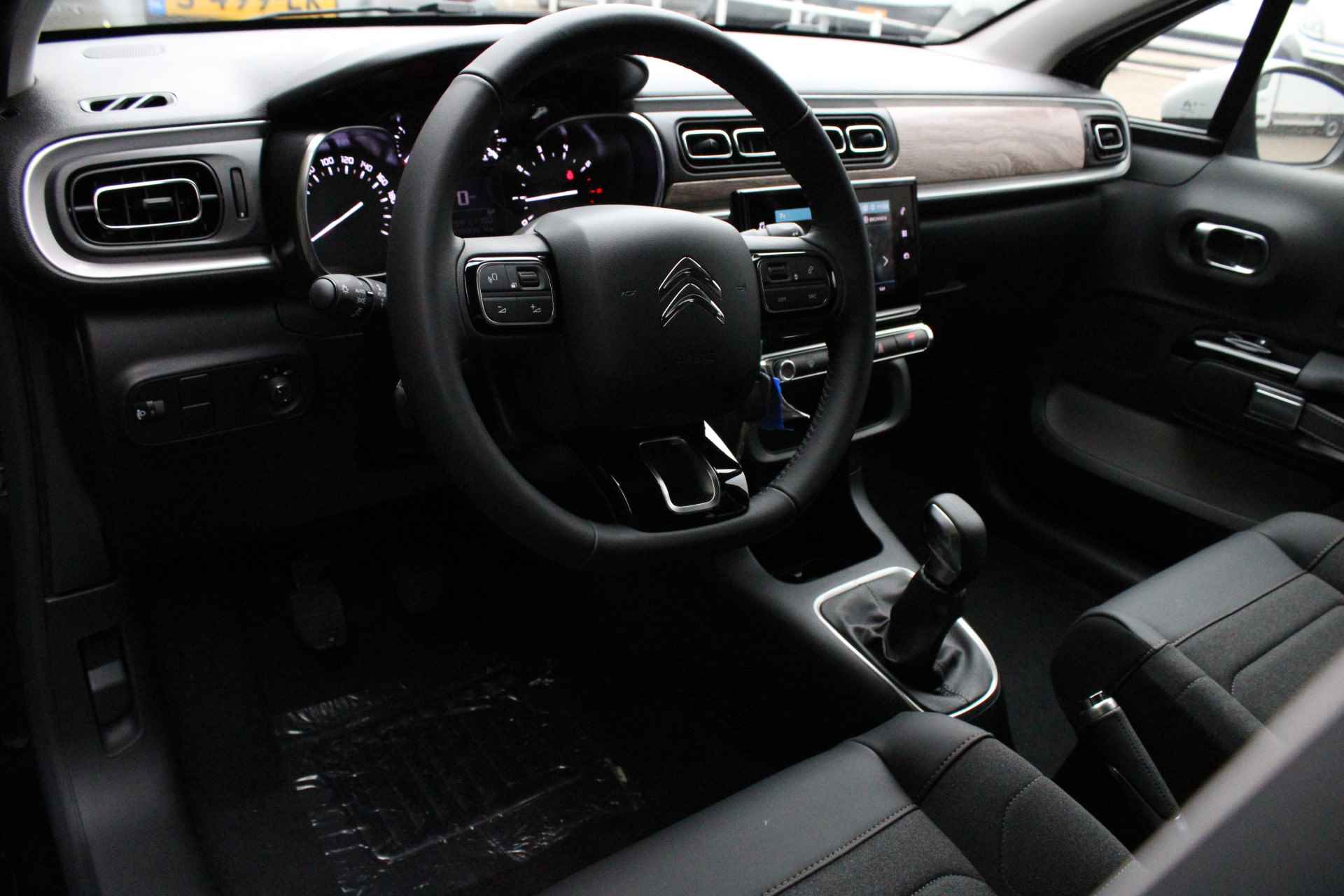 Citroën C3 1.2 PureTech 82PK Feel Edition Cruise Control, Navigatie, Climate Control, Dimlichten Automatisch, Regensensor - 17/40
