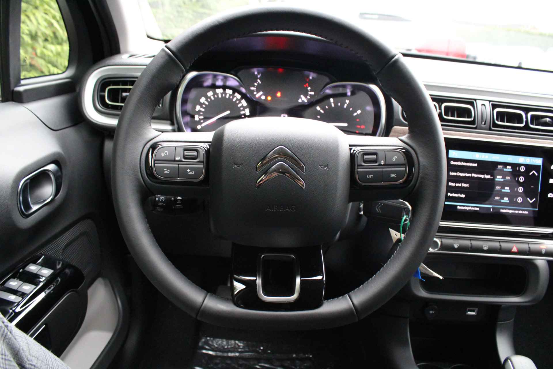 Citroën C3 1.2 PureTech 82PK Feel Edition Cruise Control, Navigatie, Climate Control, Dimlichten Automatisch, Regensensor - 27/40