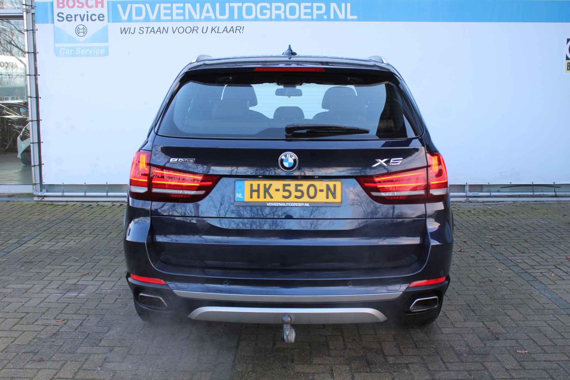 BMW X5 xDrive40e High Executive | Incl. 12 maanden Garantie | Harman/Kardon audiosysteem | Elektrisch verstelbare stoelen met geheugen | Elektrische kofferklep | Elektrisch verstelbaar stuurwiel | Stoelverwarming | 360* Camera | In/uitklapbare trekhaak | Head-up display | Cruise controle | Navigatie | Climate controle | Parkeersensoren V+A | Keyless entry/start | Volledig lederen bekleding | Origineel NL auto | NAP | - 7/75