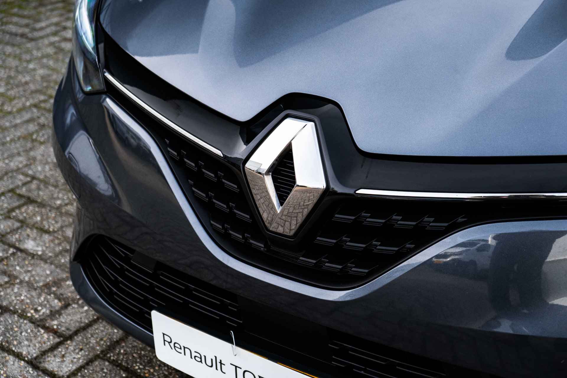 Renault Clio 1.6 E-Tech Hybrid 140 PK Intens | Parkeersensoren achter | Clima | NAVI | LM Velgen | incl. Bovag rijklaarpakket met 12 maanden garantie - 23/57