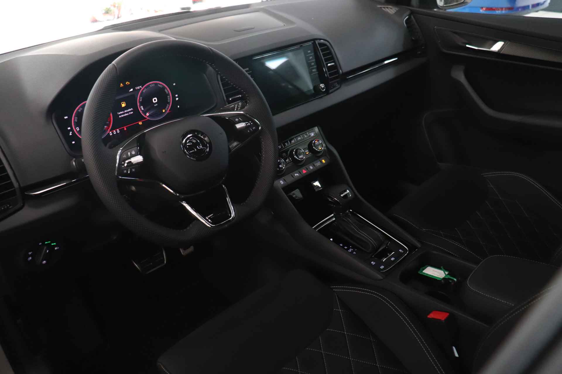 Škoda Karoq 1.5 TSI 150pk DSG ACT Sportline Business | Adaptieve cruise control | Trekhaak wegklapbaar | Stoel- & stuurwiel verwarmd | Camera - 12/38