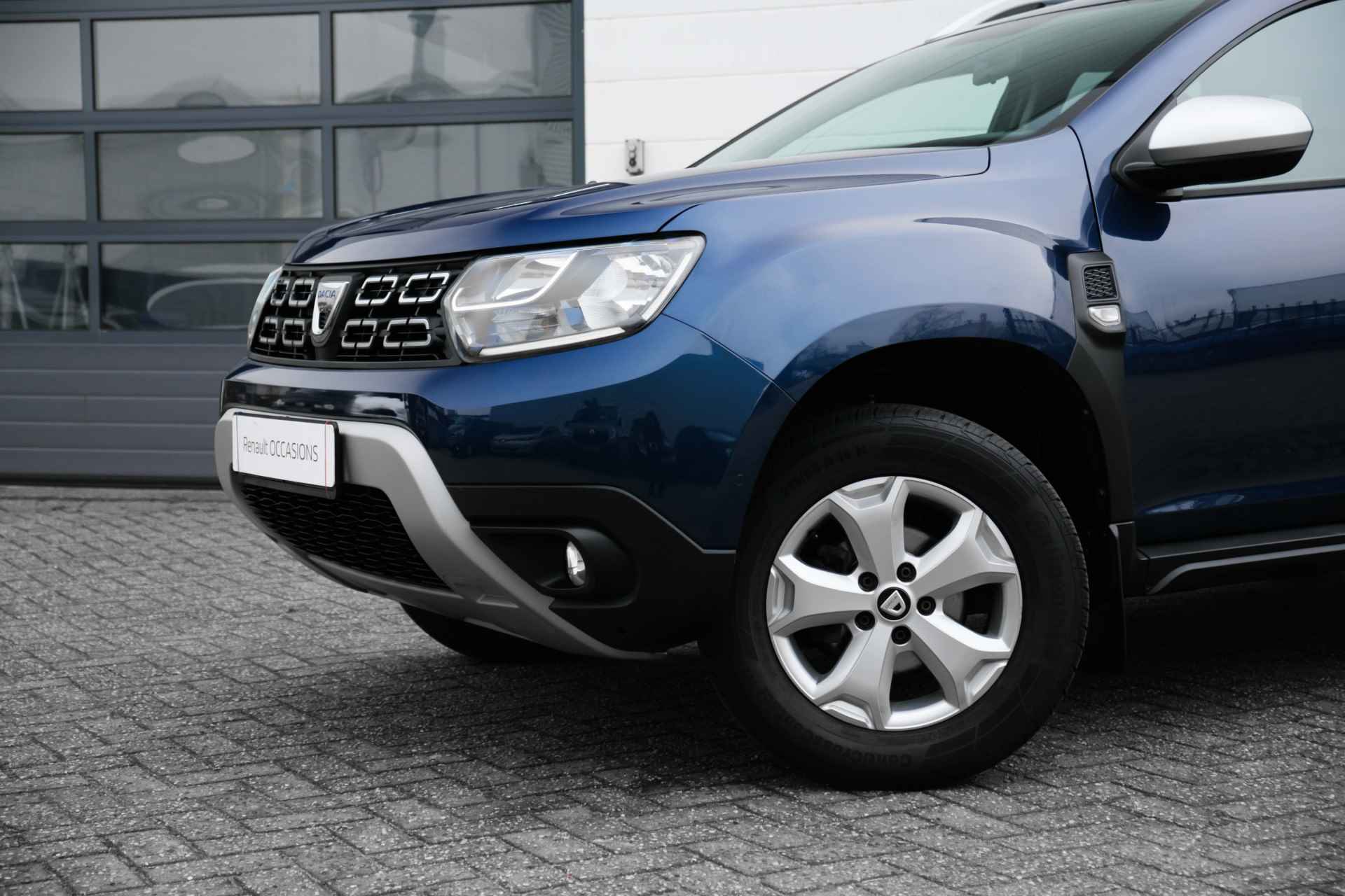 Dacia Duster 1.6 SCe 115 PK Comfort | Trekhaak | ECC | NAVI | Camera achter | Dode hoek sensoren | | incl. Bovag rijklaarpakket met 12 maanden garantie | - 6/38