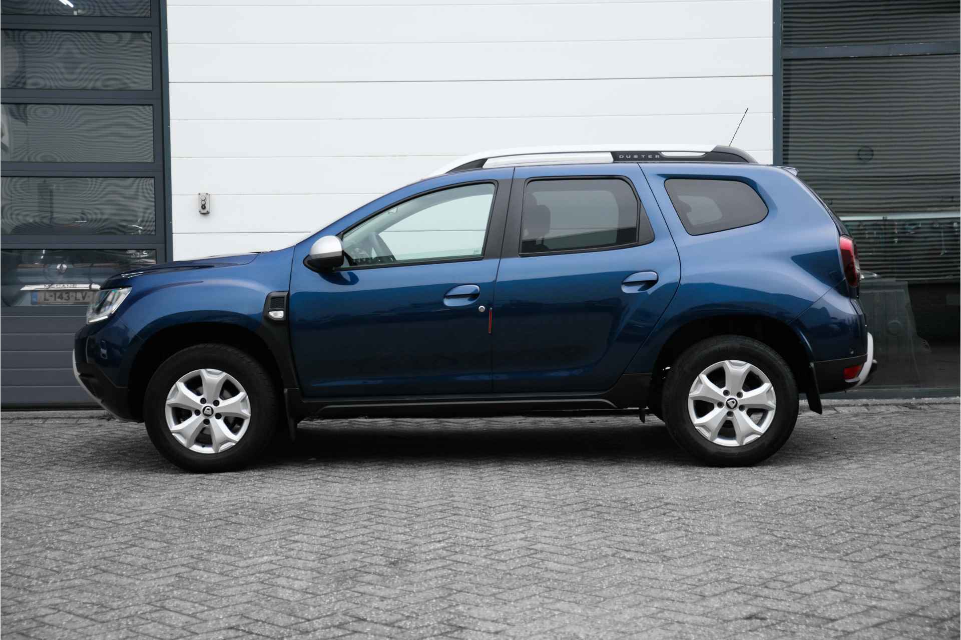 Dacia Duster 1.6 SCe 115 PK Comfort | Trekhaak | ECC | NAVI | Camera achter | Dode hoek sensoren | | incl. Bovag rijklaarpakket met 12 maanden garantie | - 5/38