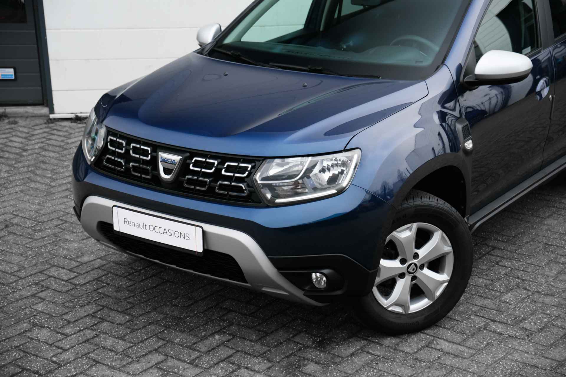 Dacia Duster 1.6 SCe 115 PK Comfort | Trekhaak | ECC | NAVI | Camera achter | Dode hoek sensoren | | incl. Bovag rijklaarpakket met 12 maanden garantie | - 15/38