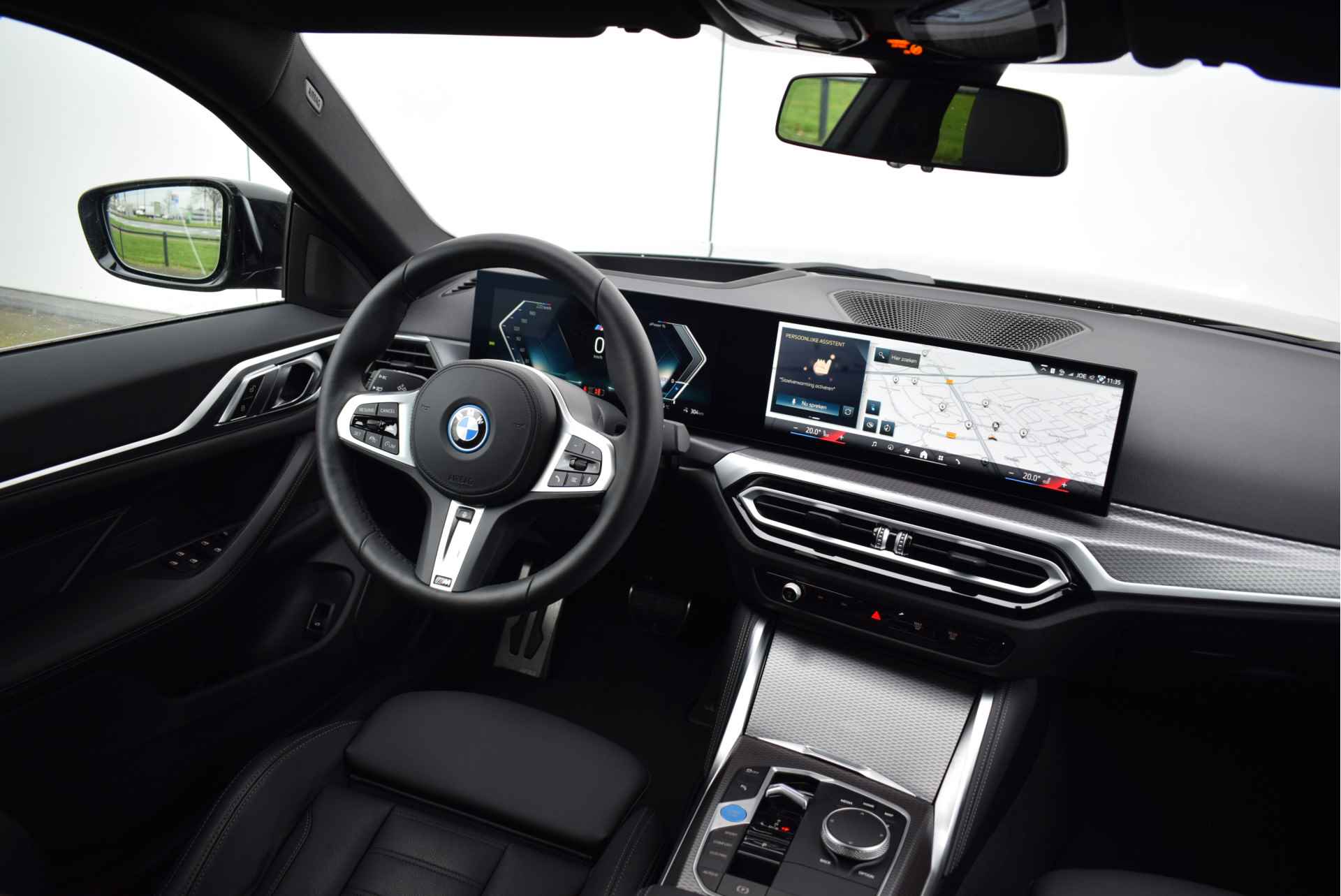 BMW i4 eDrive35 High Executive M Sport / Live Cockpit Professional / Stoelverwarming / Verwarmd stuurwiel / Active Cruise Control / Parking Assistant - 16/28