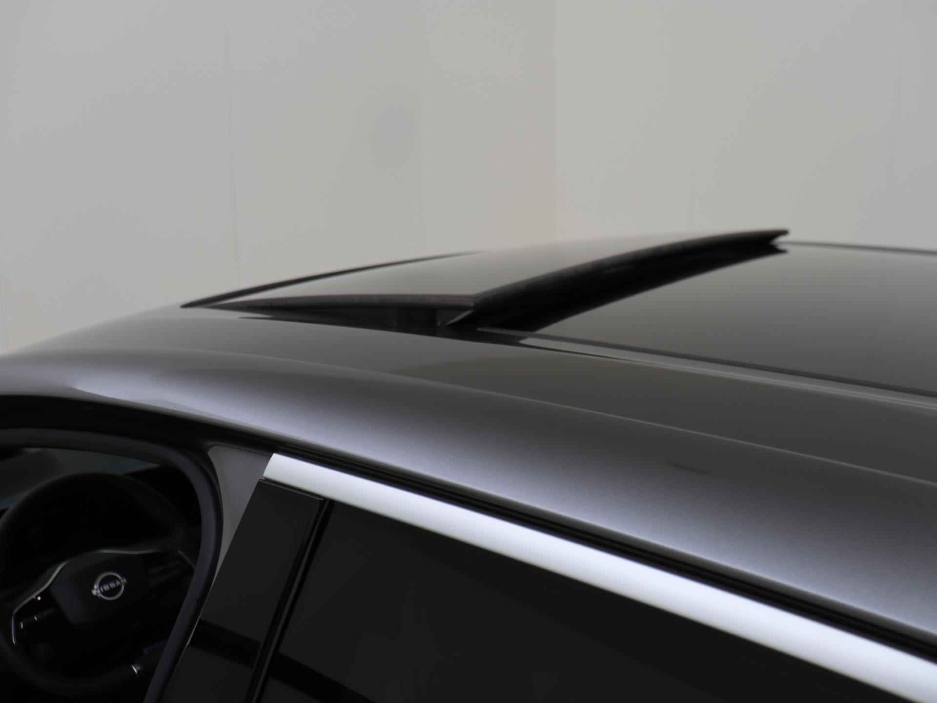 Nissan Ariya Evolve 66 kWh | Premium Leder | Stoelverwarming & -ventilatie | Glazen Schuif/kanteldak | ProPILOT | 360-graden Camera | Full-Map Navigatie | Apple Carplay & Android Auto - 31/35