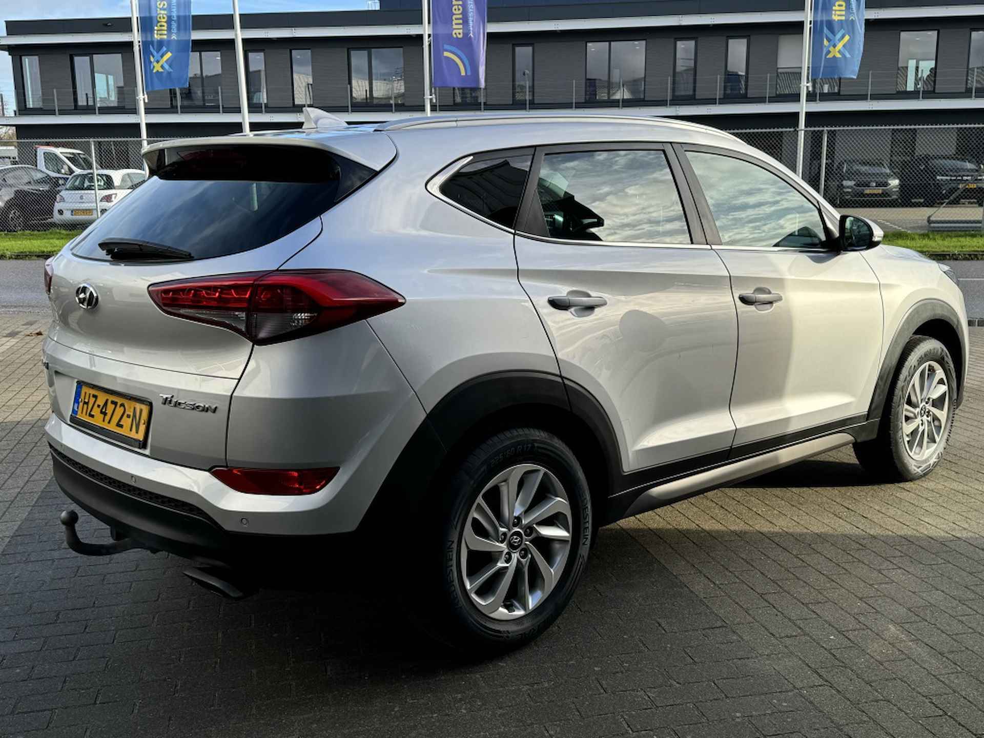 Hyundai Tucson 1.6 GDI Comfort | Trekhaak afneembaar 1400KG! | Navigatie | Stoe - 9/33