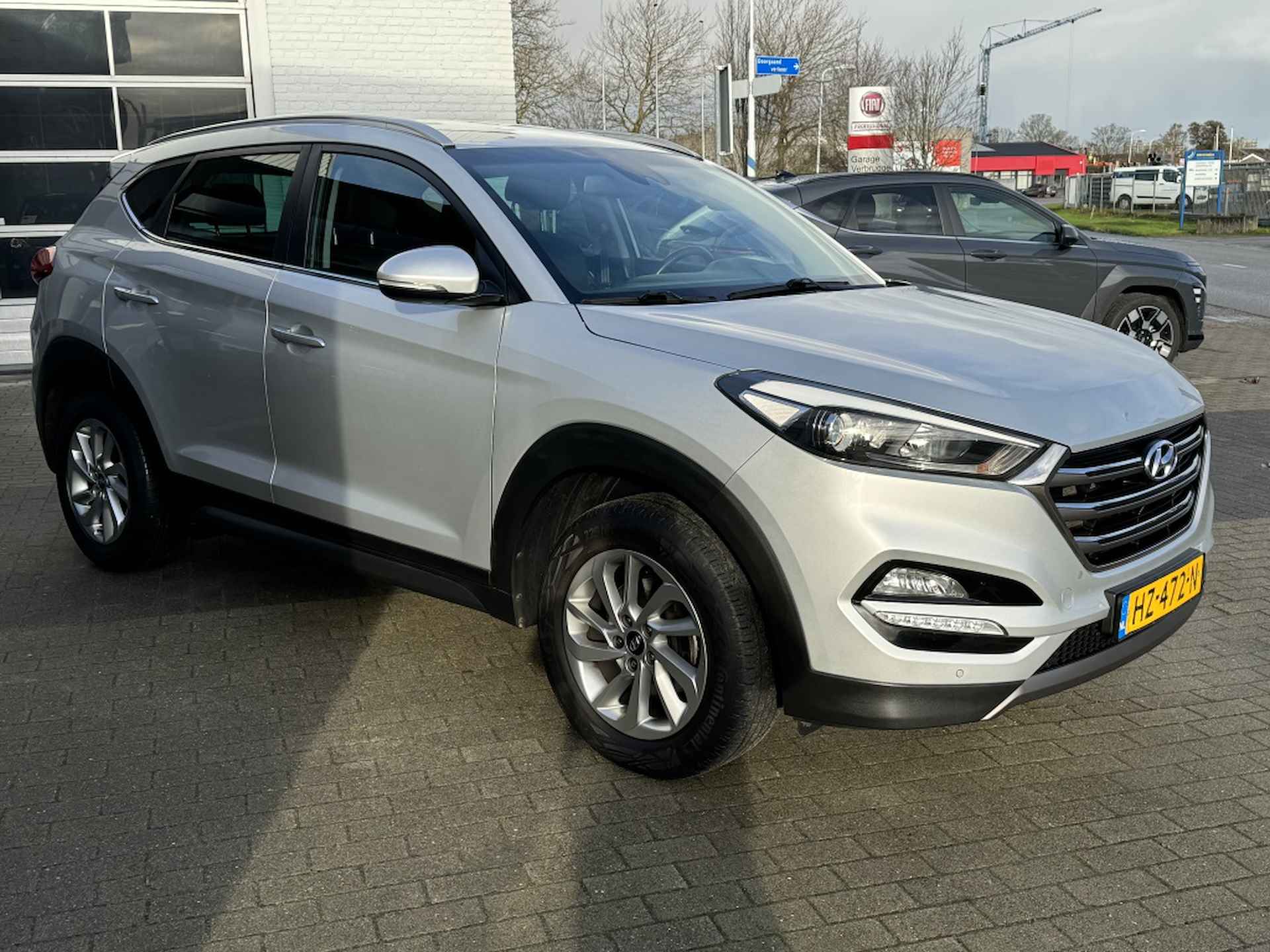 Hyundai Tucson 1.6 GDI Comfort | Trekhaak afneembaar 1400KG! | Navigatie | Stoe - 12/33