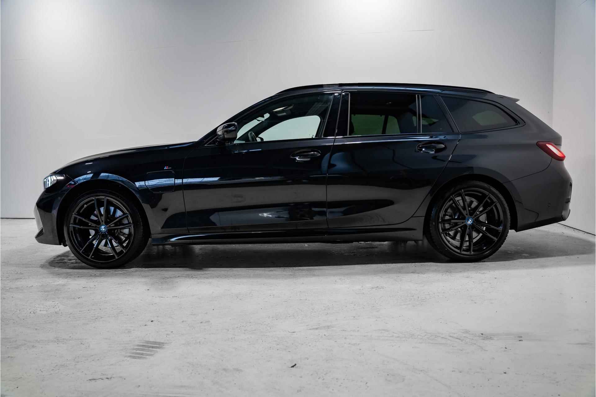 BMW 3 Serie Touring 320e M Sportpakket Aut. - 4/25