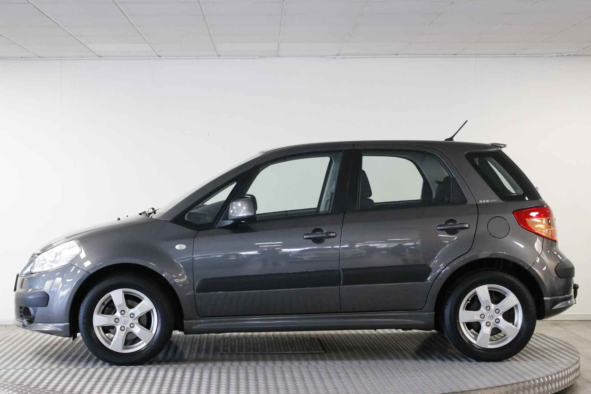 Suzuki SX4 1.6 Comfort. Climate | Cruise | Lichtmetaal | Elektrische ramen | Trekhaak. - 9/30