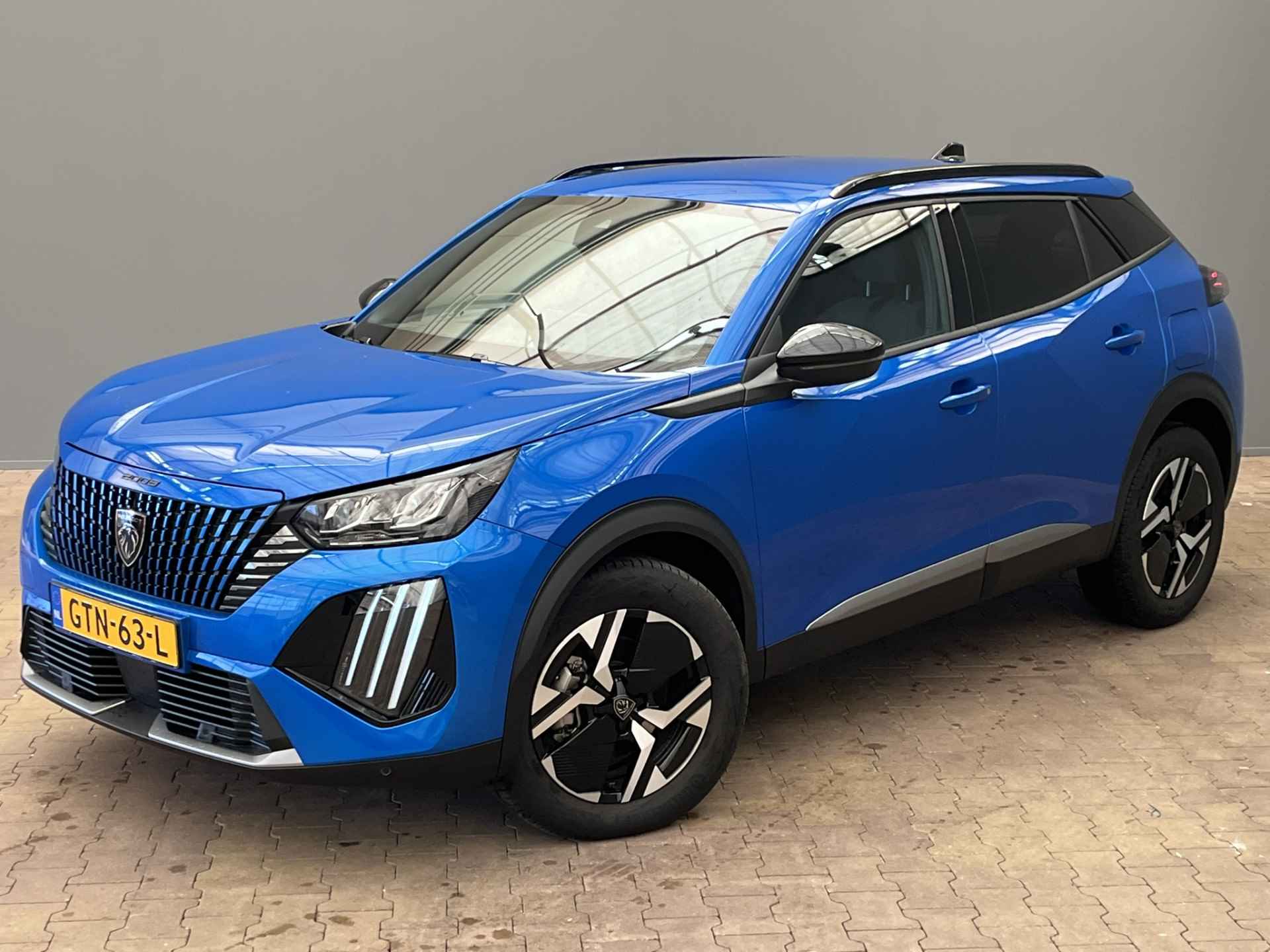 Peugeot 2008 1.2 Hybrid 136PK Allure | Camera | Apple/Android Carplay | 17" Lichtmetaal | Leder/Stof | Apple/Android Carplay | LED | Parkeersensoren | Virtueel Dashboard - 35/40