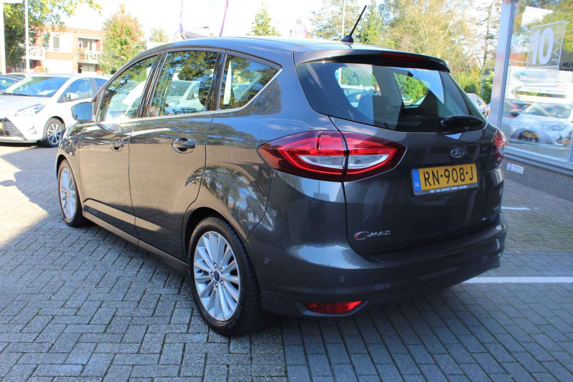 Ford C-Max 1.5 TITANIUM AD-CRUISE KEYLESS BLIND SPOT APPLE/ANDROID NAVI CLIMA CAMERA ELEKTRISCH WEGKLAPBARE TREKHAAK TREKGEWICHT 1500KG PARK-SENSOREN VOOR EN ACHTER BLUETOOTH EL-SPIEGELS NL-AUTO 17'' INCH LICHTMETAAL MET ALL-SEASEN BANDEN - 4/31